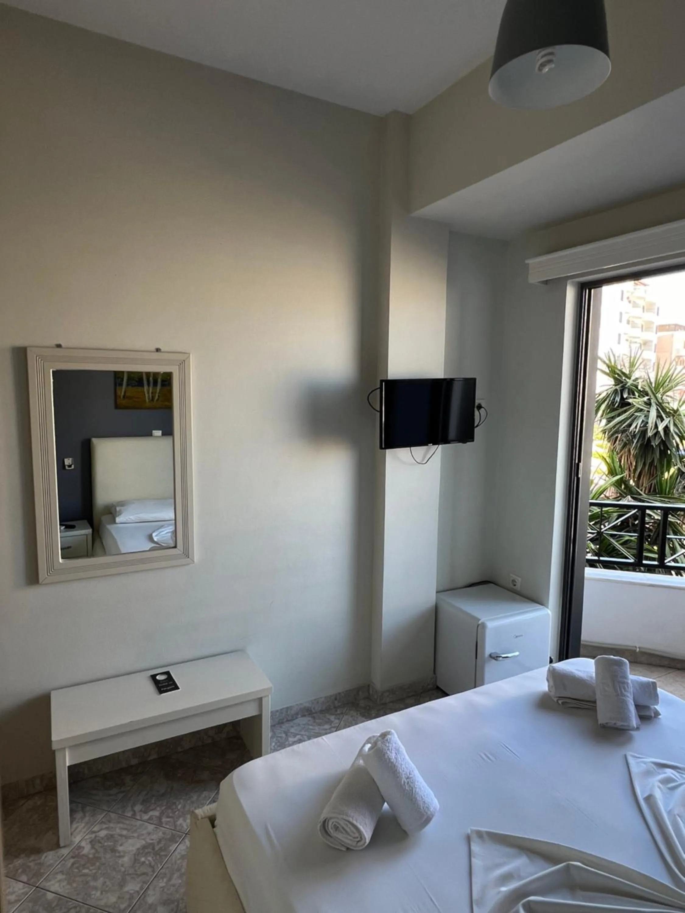Bed in Privé City Hotel