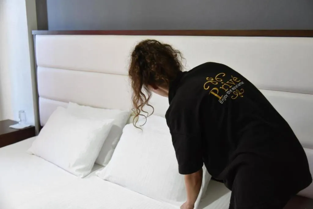 Bed in Privé City Hotel