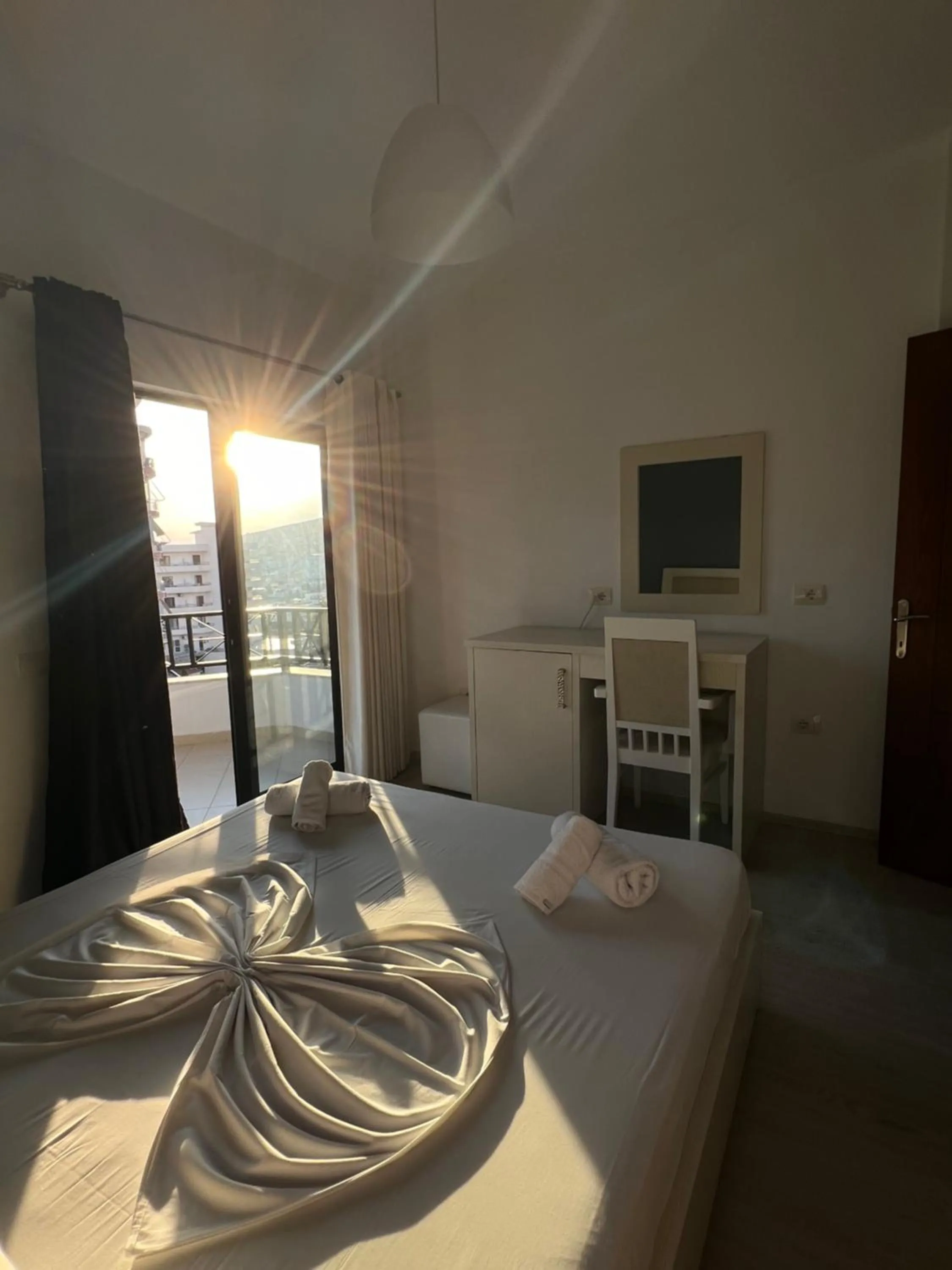 Bed in Privé City Hotel