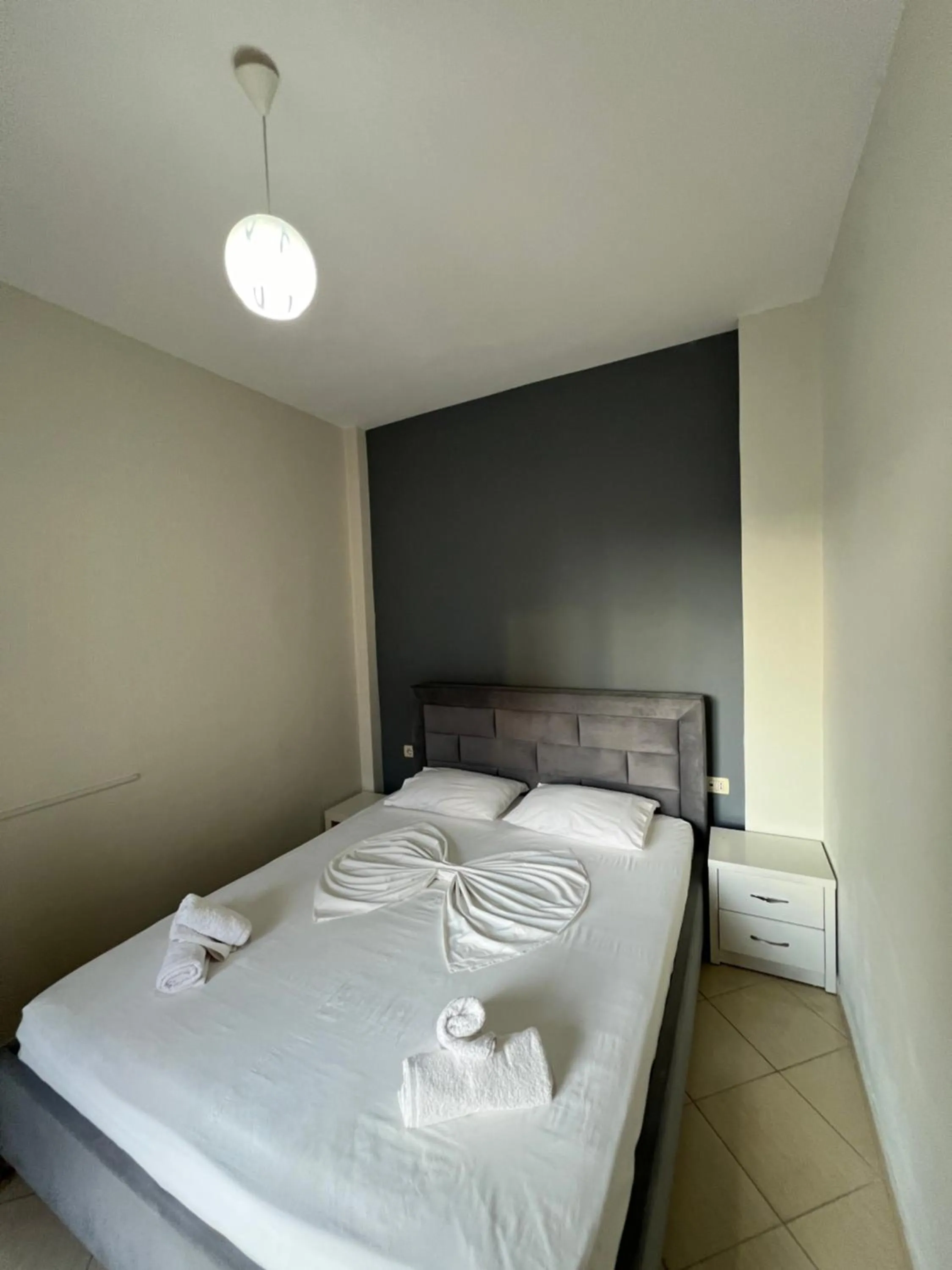 Bed in Privé City Hotel