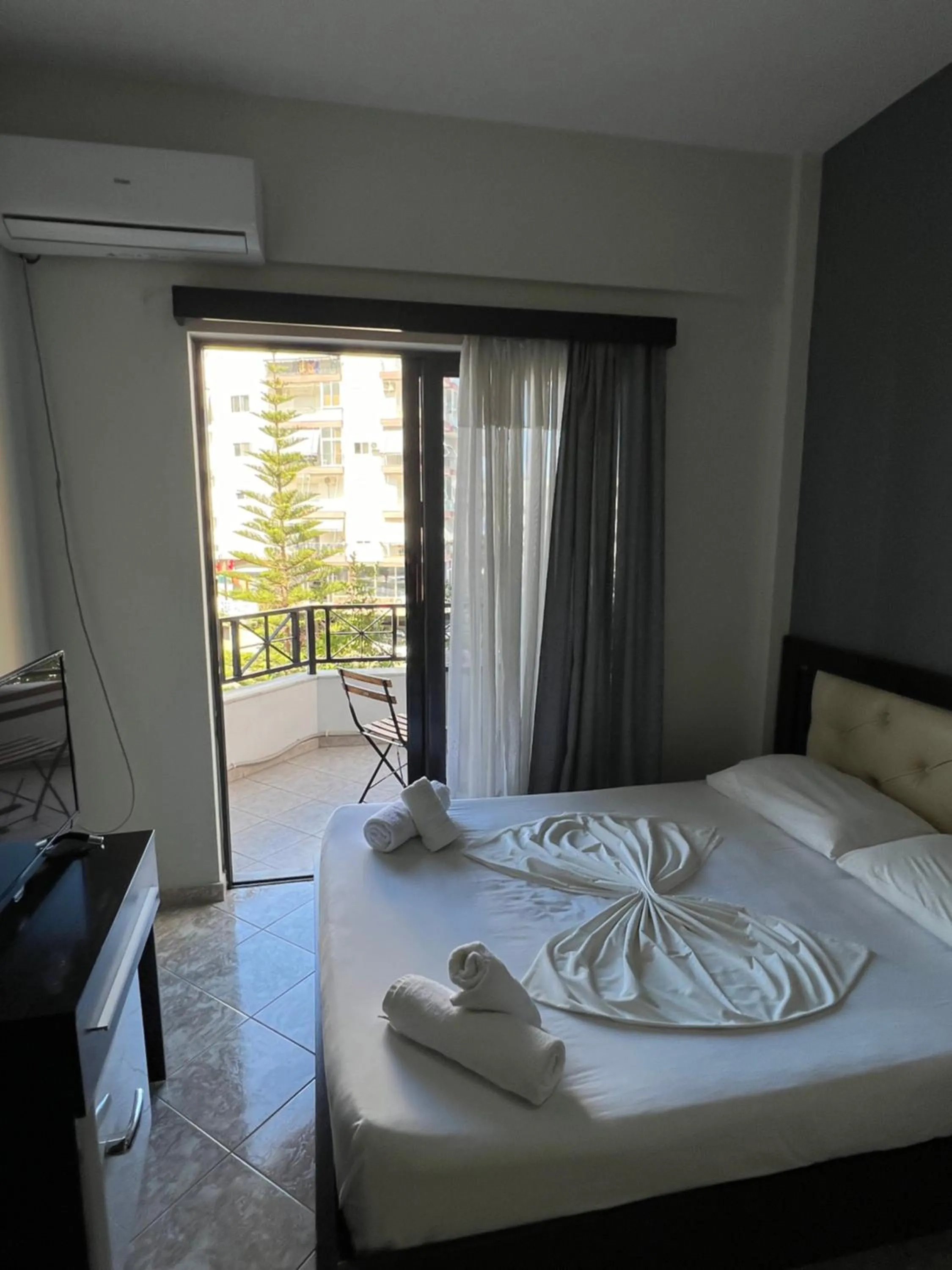 Bed in Privé City Hotel