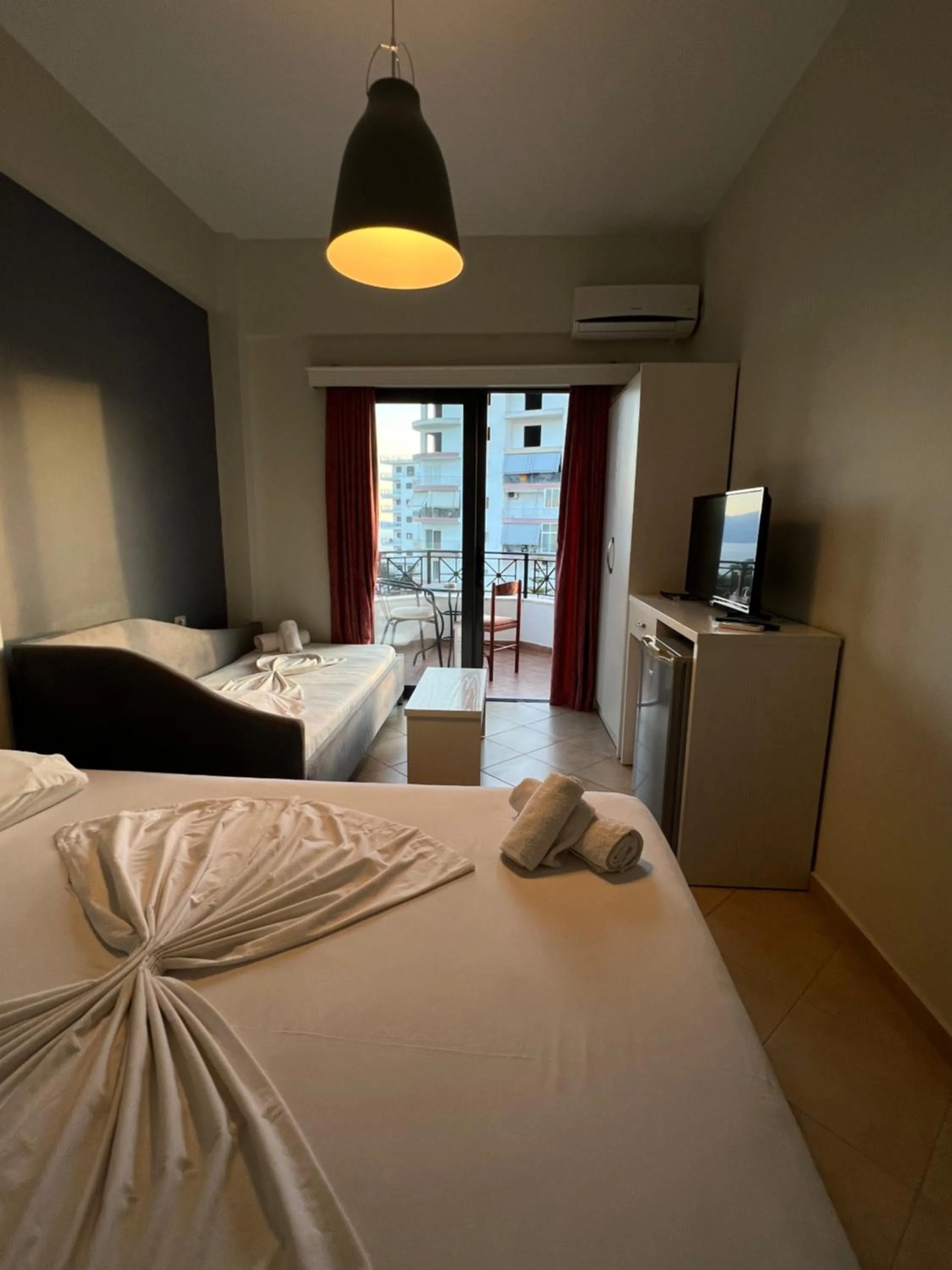 Bed in Privé City Hotel
