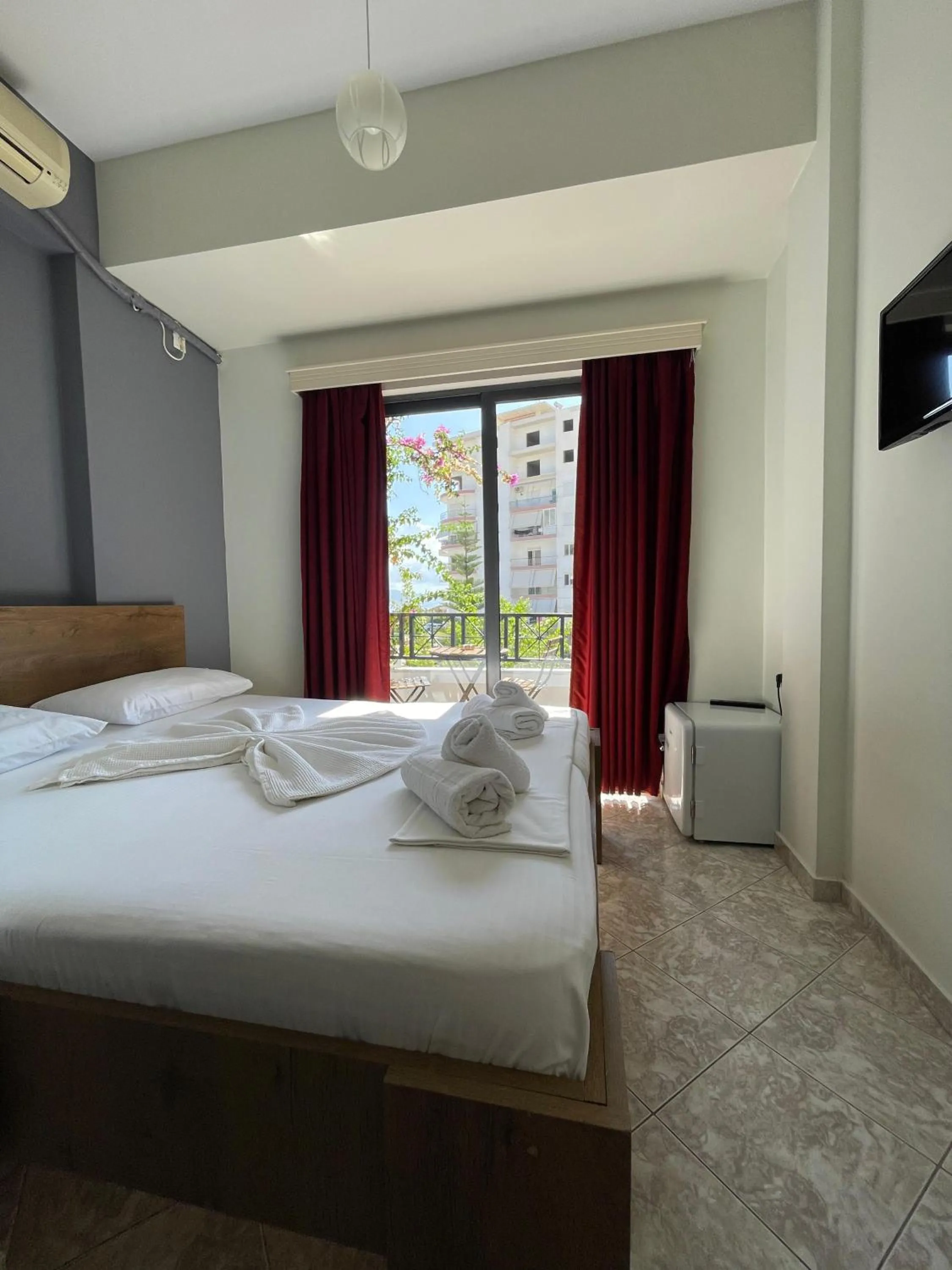 Bed in Privé City Hotel