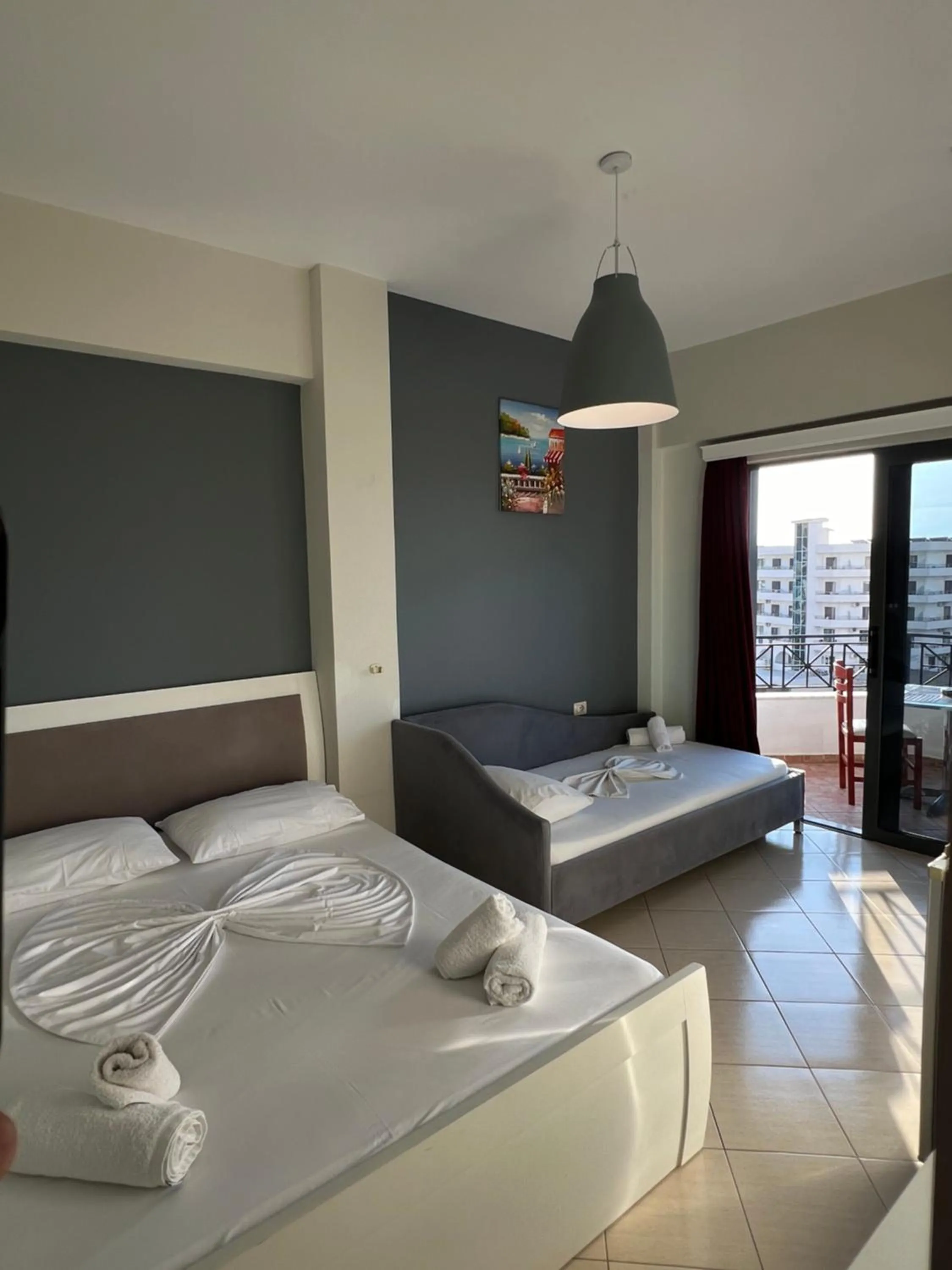 Bed in Privé City Hotel
