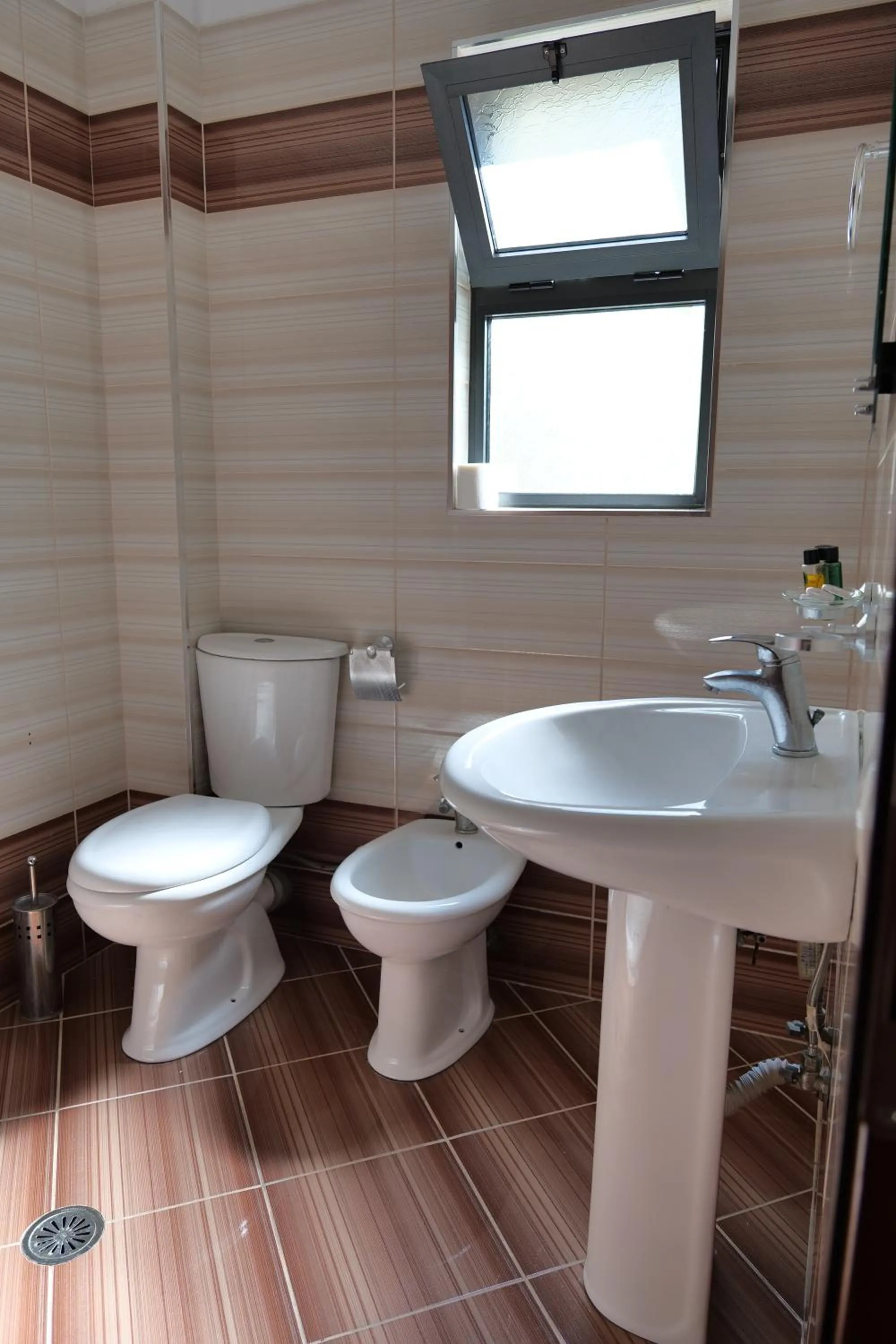 Bathroom in Privé City Hotel
