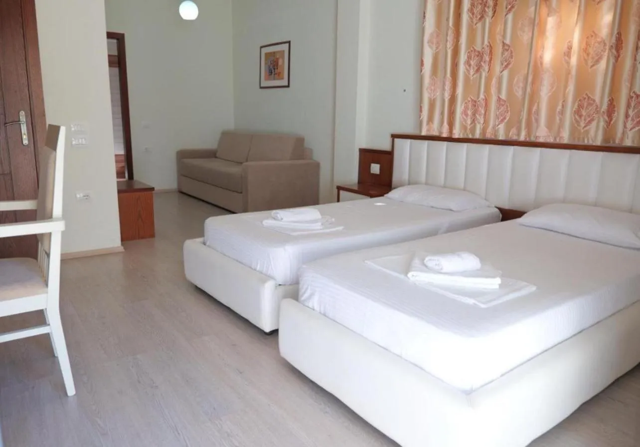 Bed in Privé City Hotel