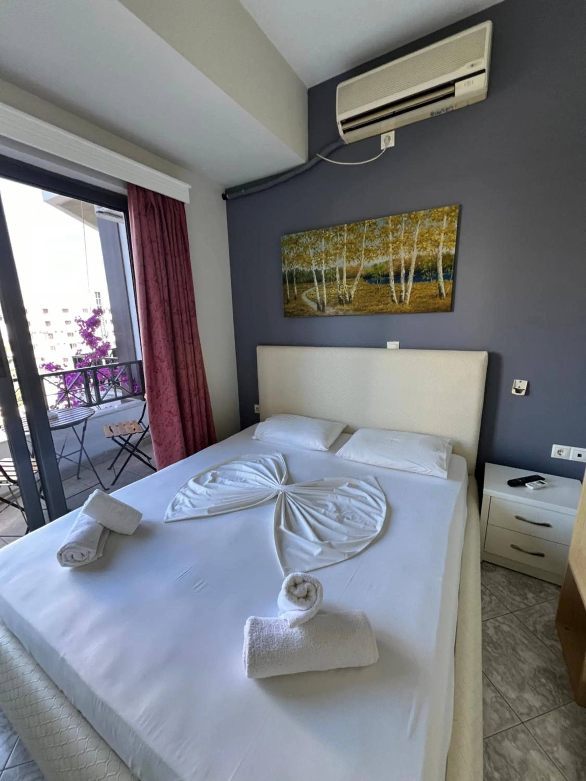 Bed in Privé City Hotel