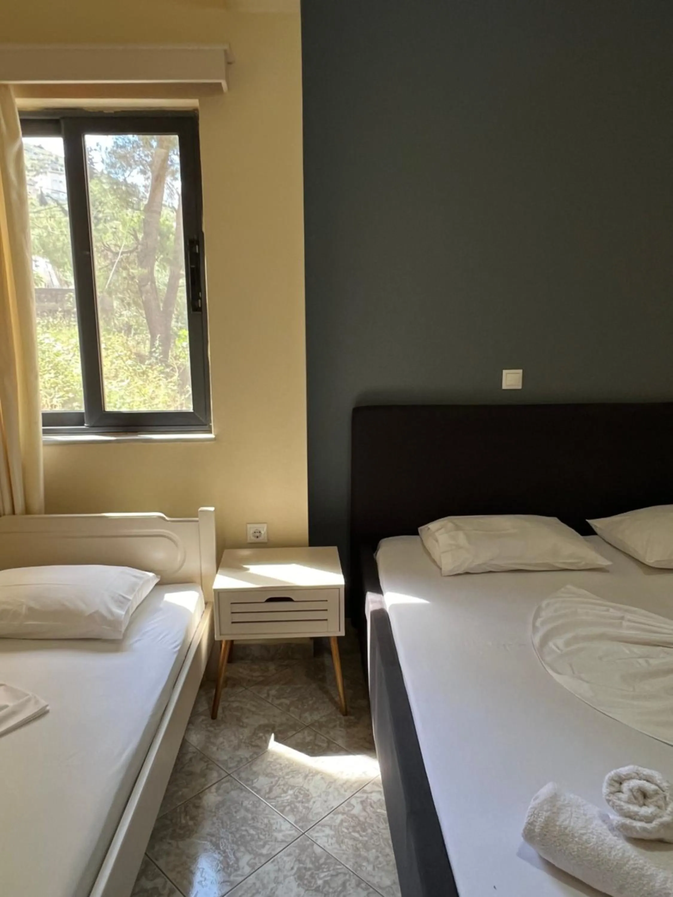 Bed in Privé City Hotel