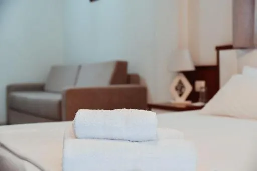 Bed in Privé City Hotel