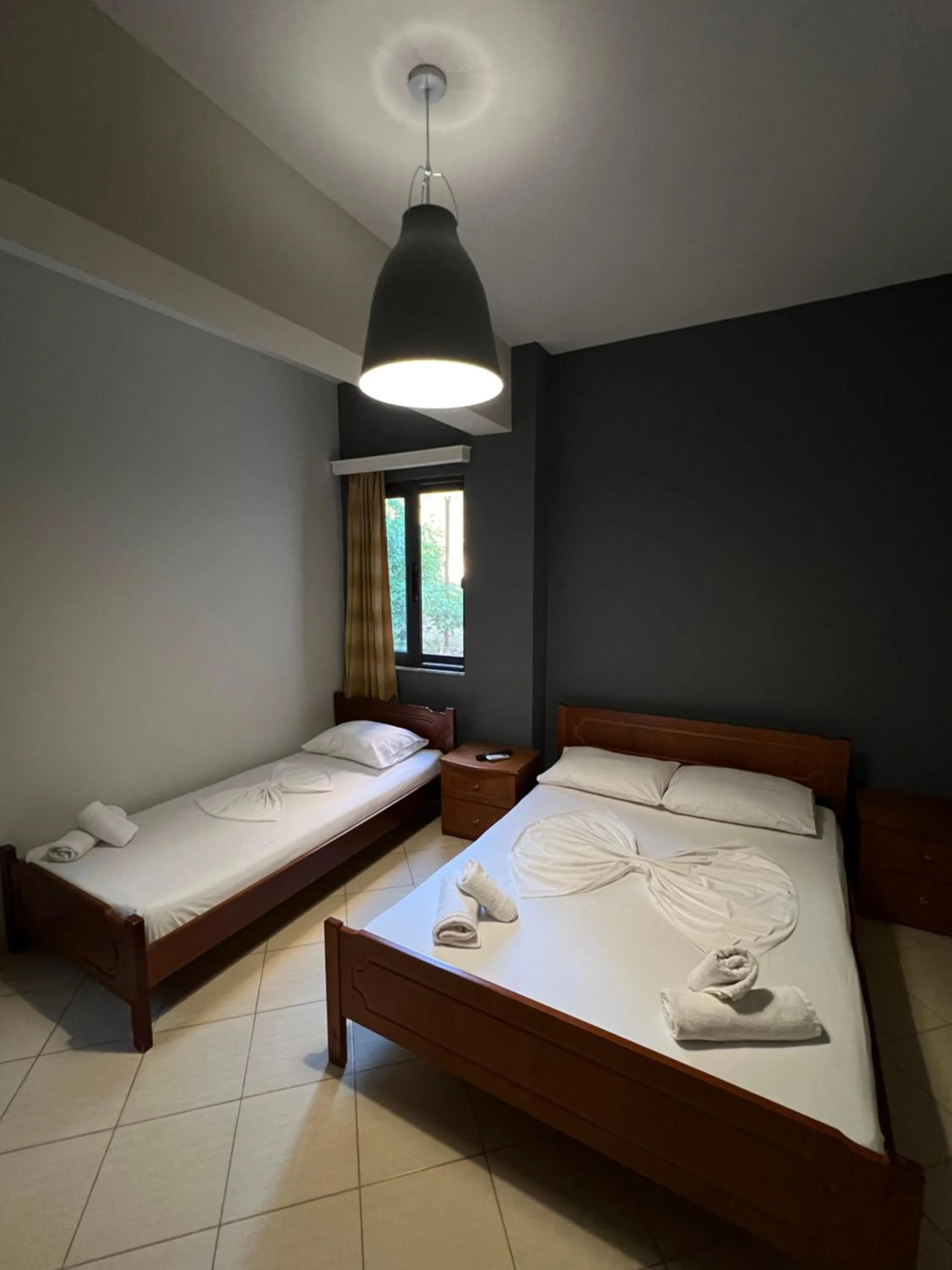 Bed in Privé City Hotel