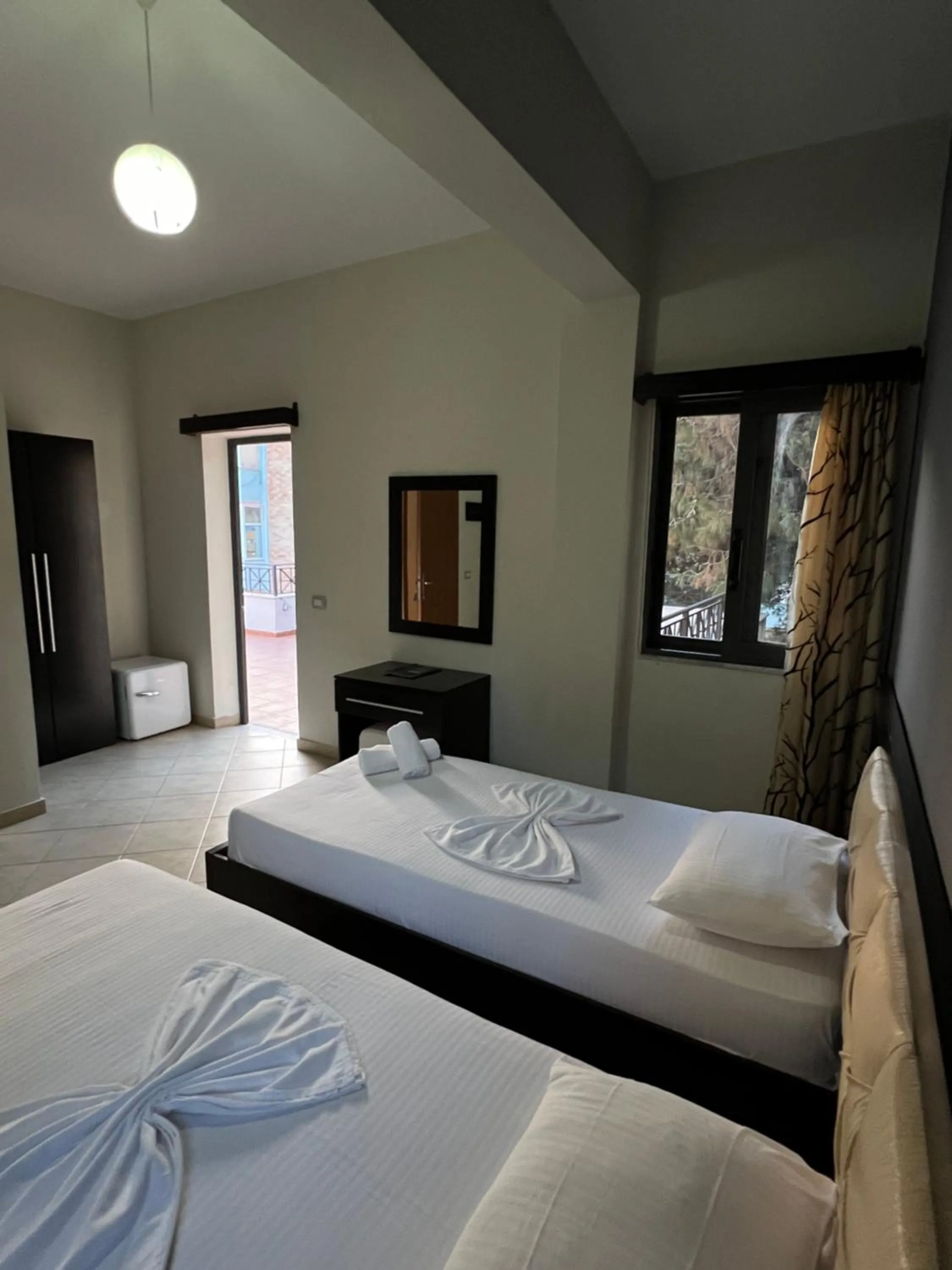 Bed in Privé City Hotel