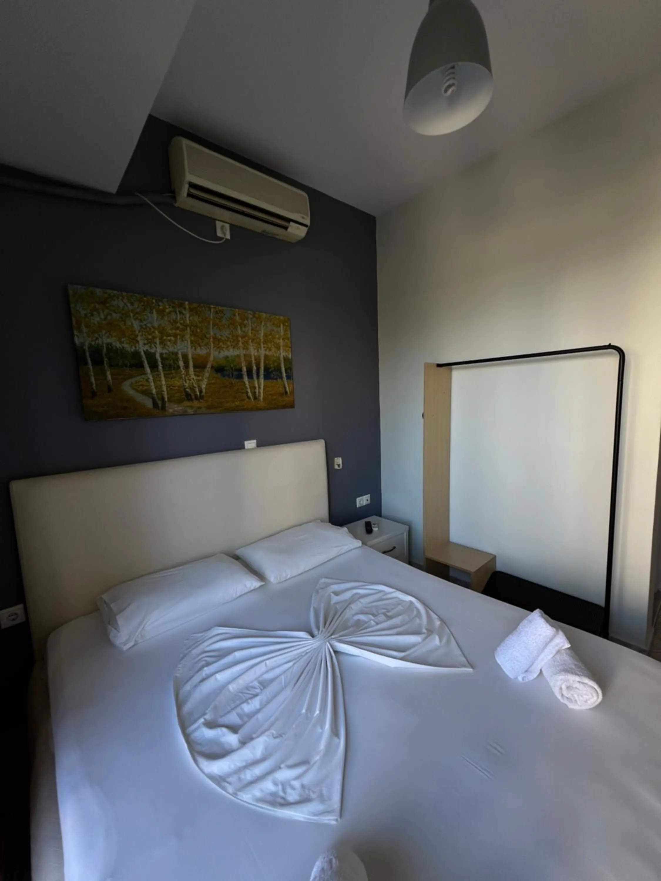 Bed in Privé City Hotel