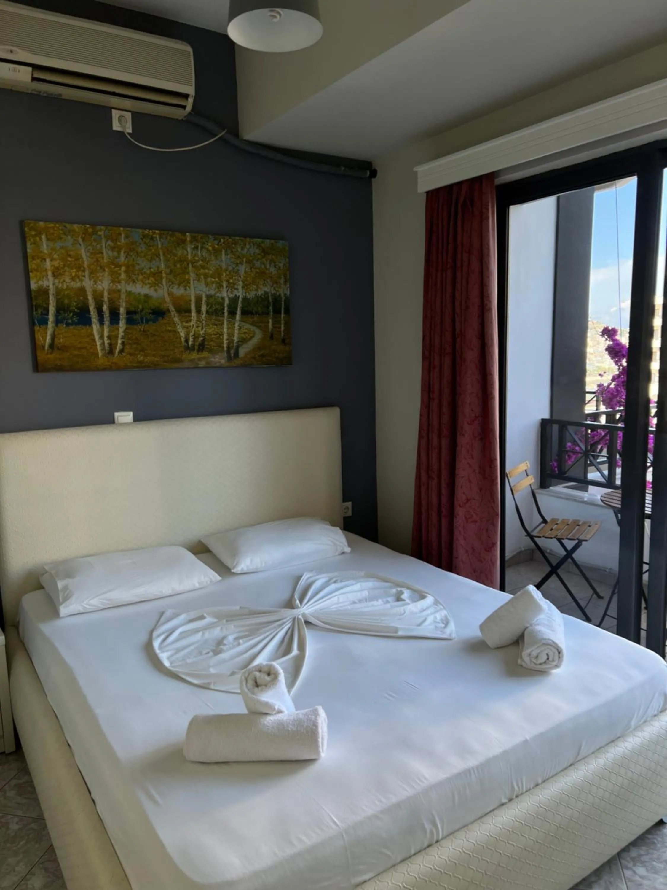 Bed in Privé City Hotel