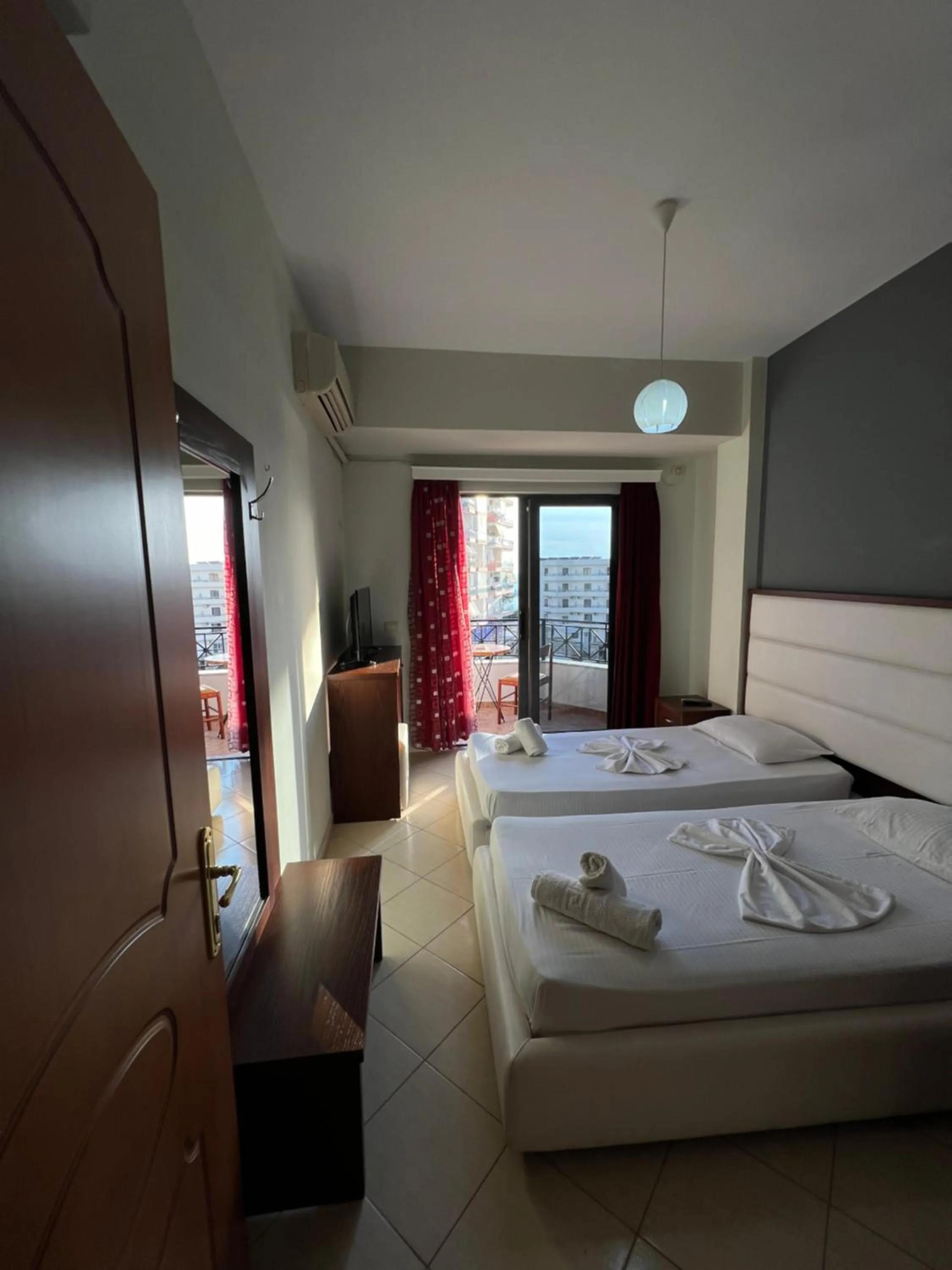 Bed in Privé City Hotel