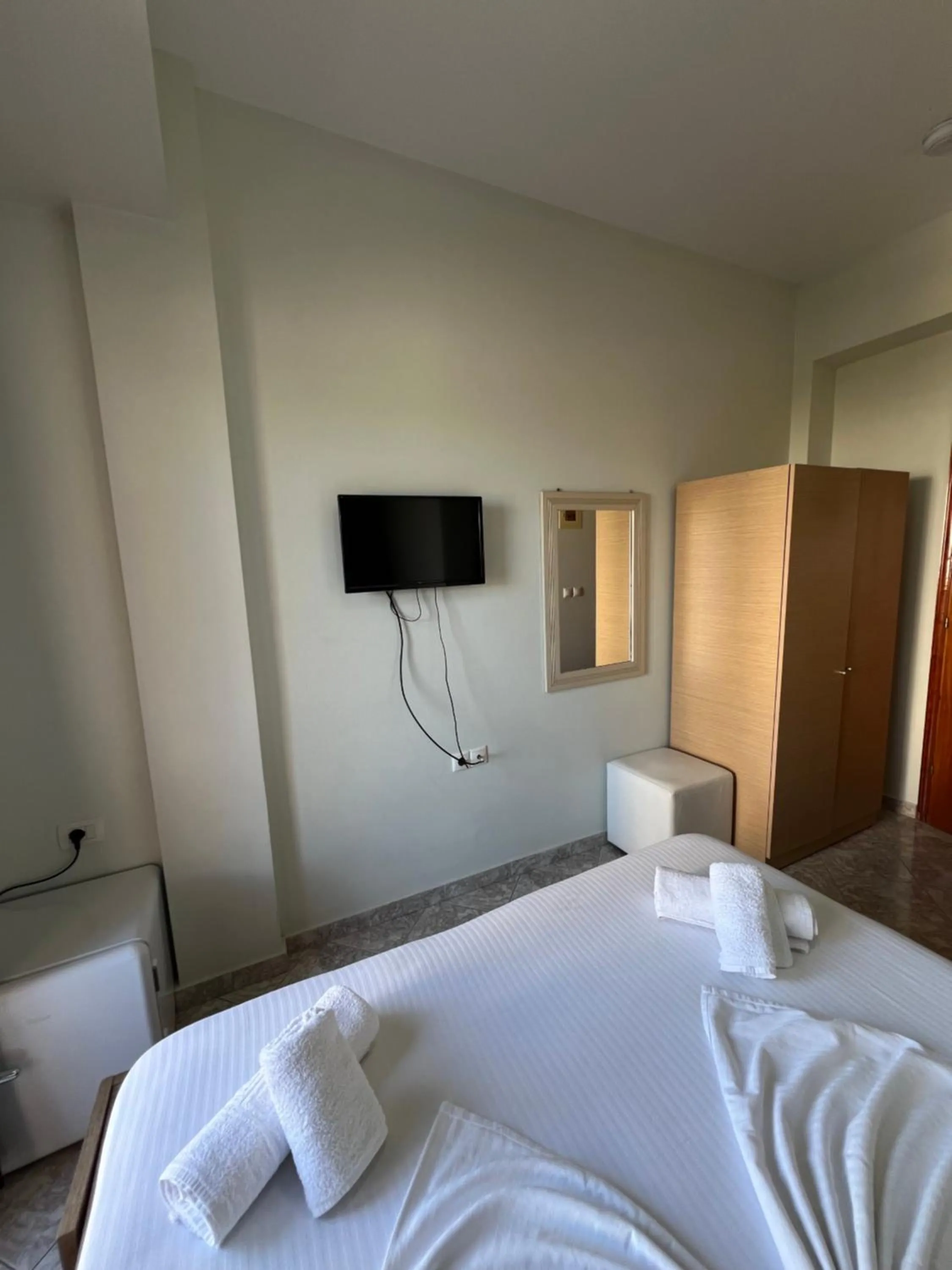 Bed in Privé City Hotel