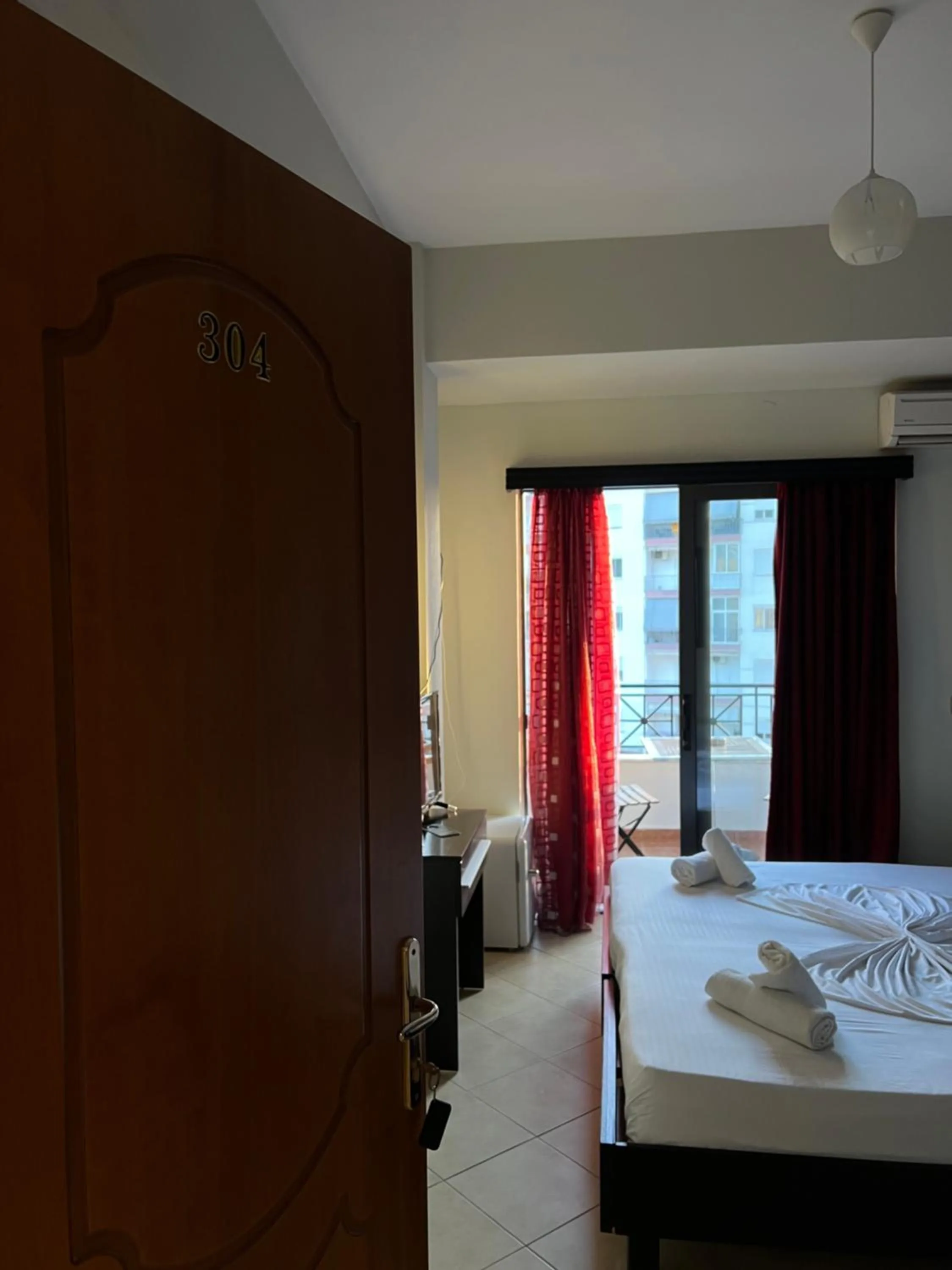 Bed in Privé City Hotel