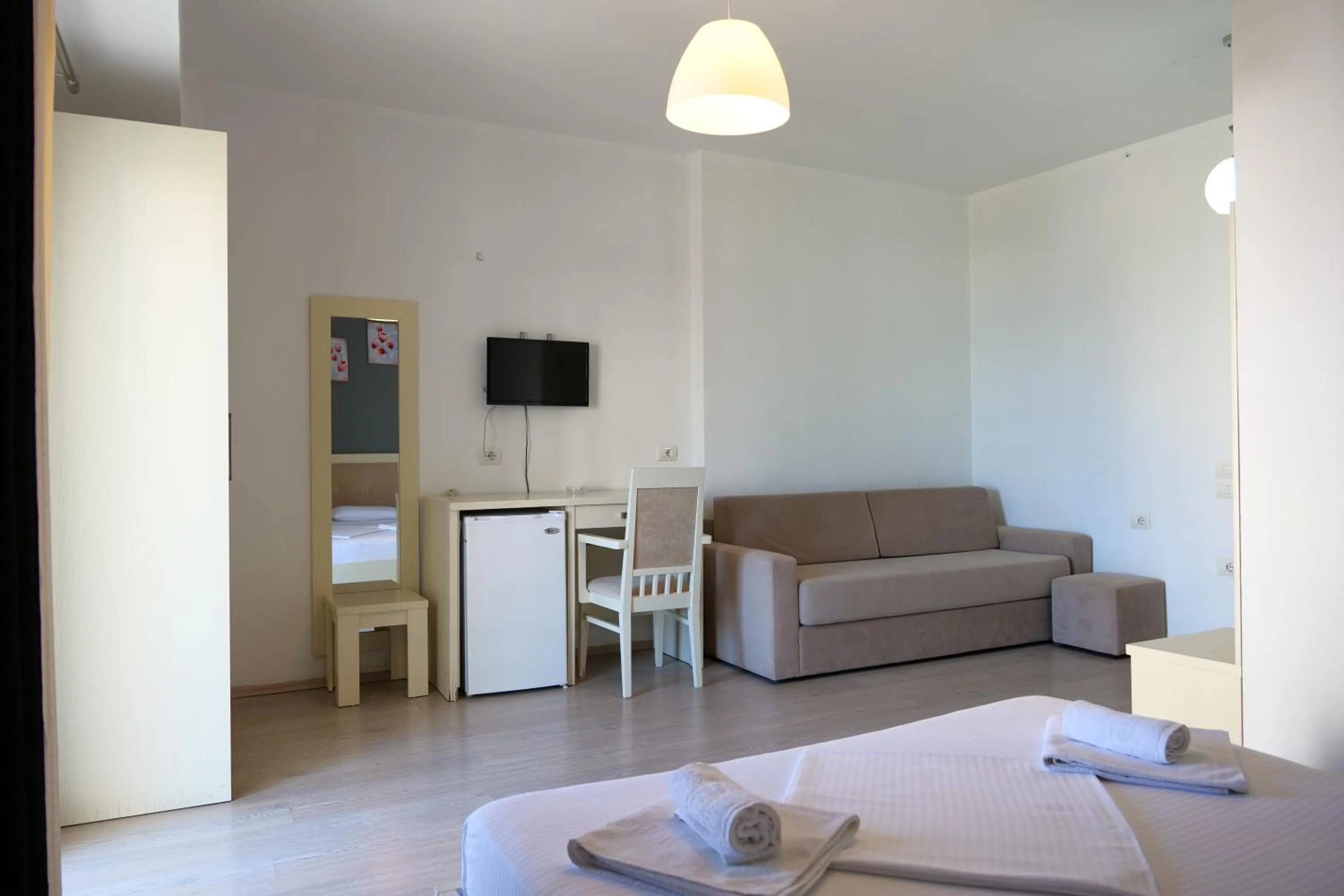 Bedroom in Privé City Hotel