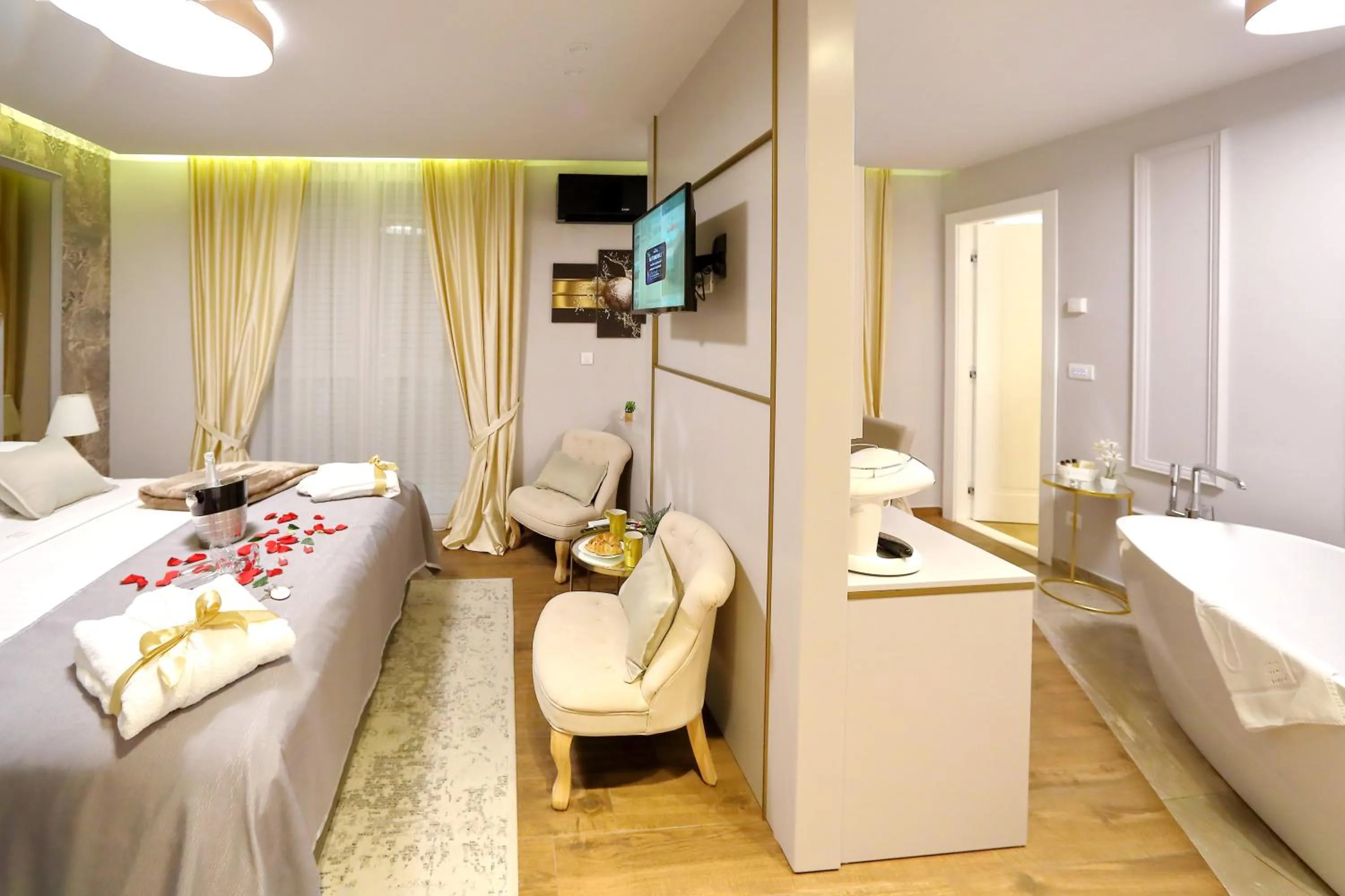 Living room, Bed in Luxury rooms Kadena