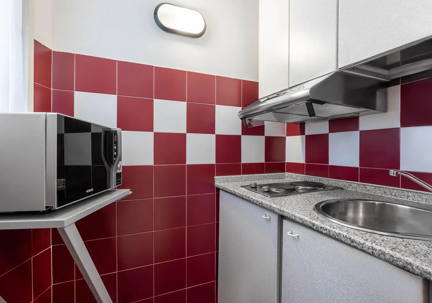 Kitchen or kitchenette in iH Hotels Milano ApartHotel Argonne Park