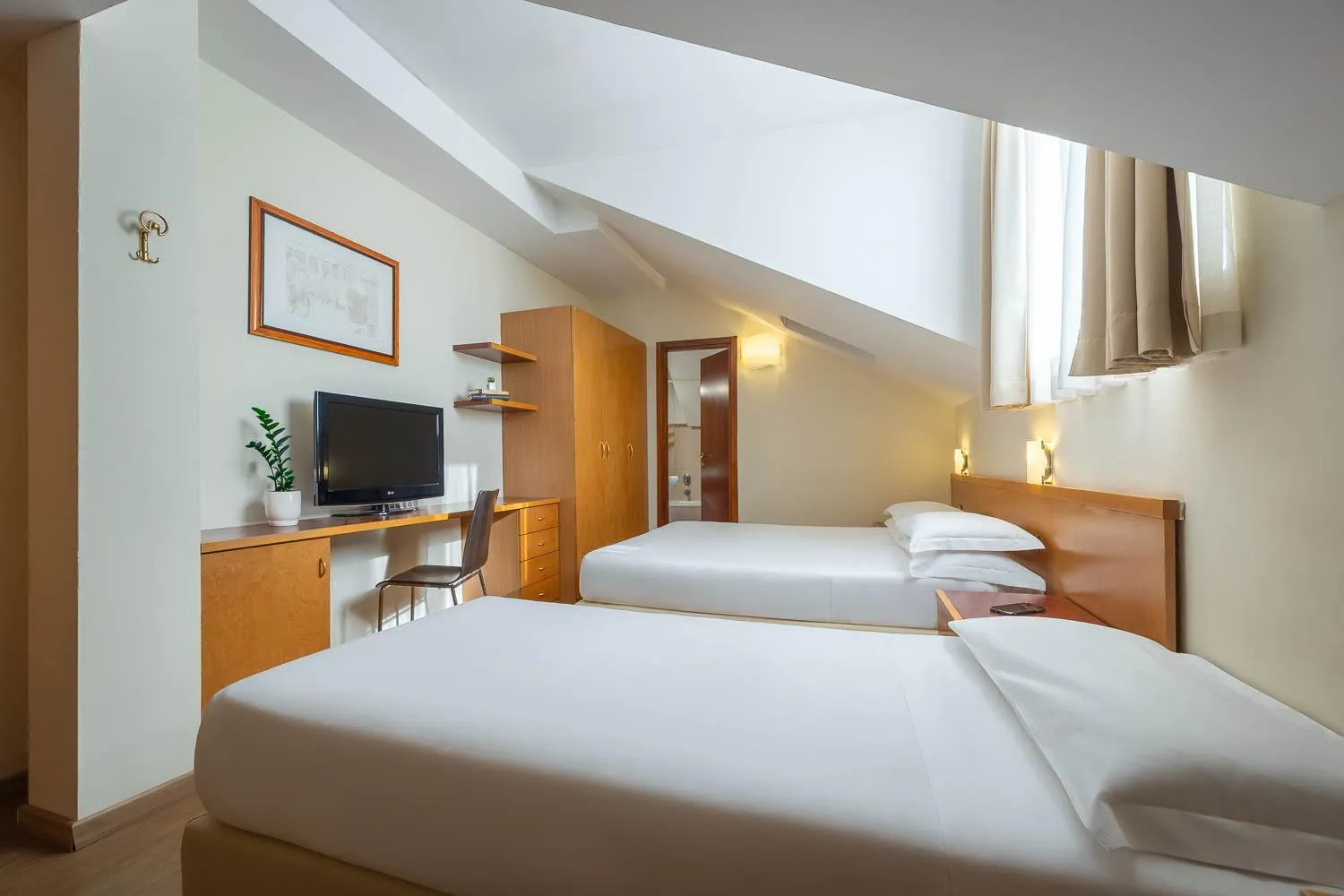 Bed in iH Hotels Milano ApartHotel Argonne Park