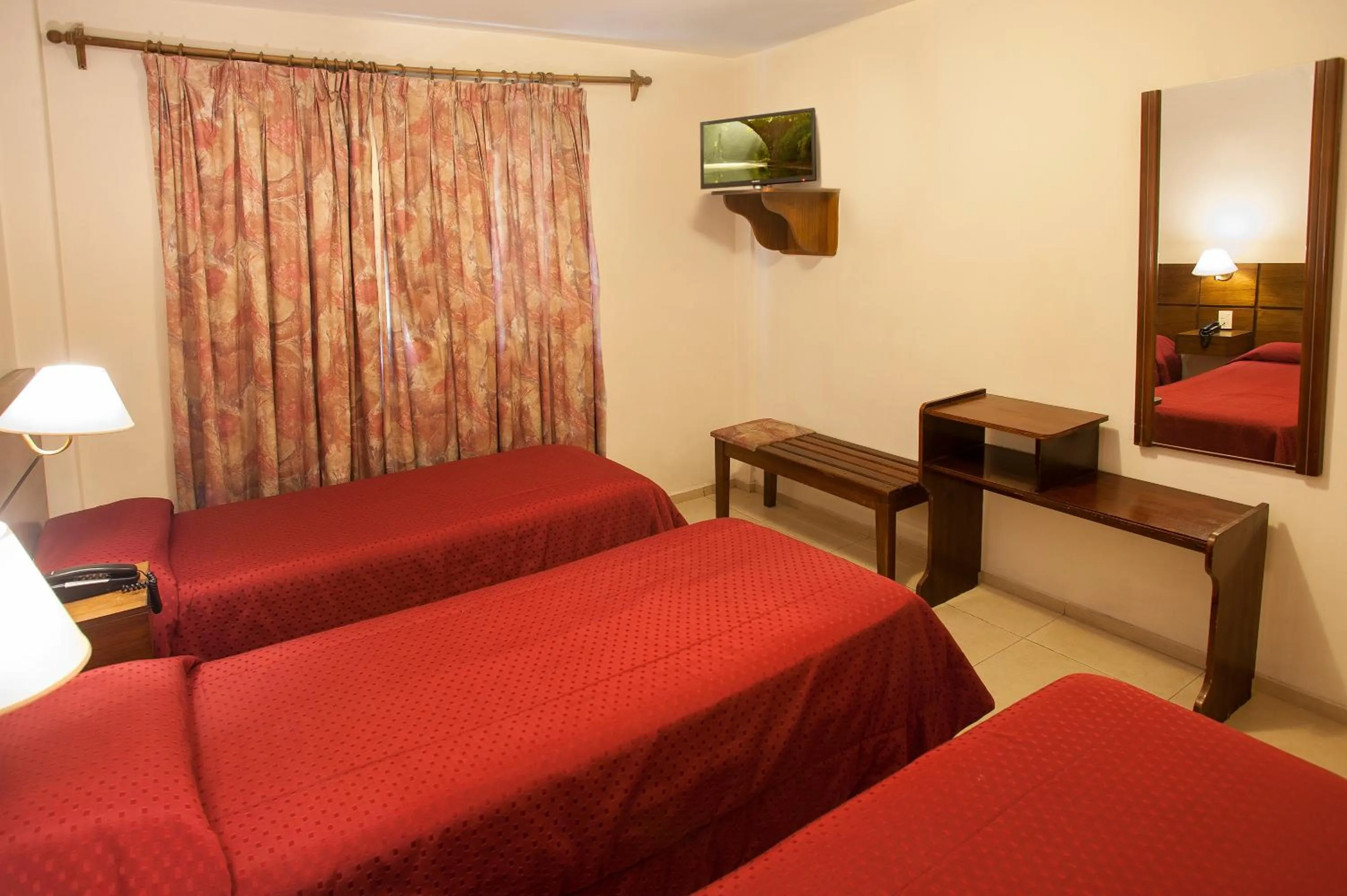 Bed in Hotel Carollo