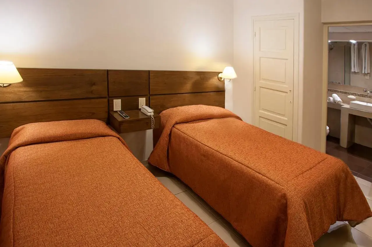 Bed in Hotel Carollo Bed in Hotel Carollo