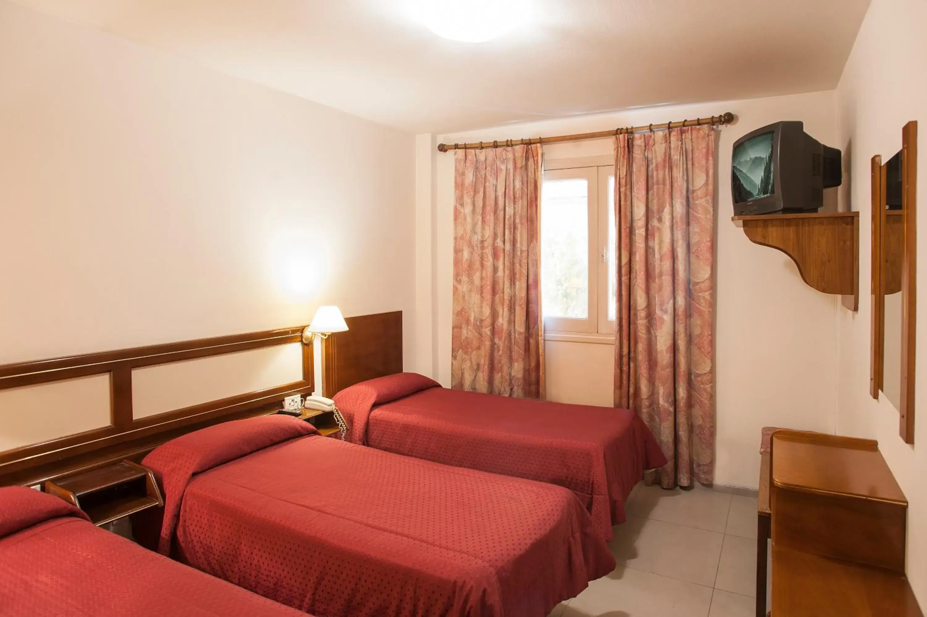 Bed in Hotel Carollo Bed in Hotel Carollo