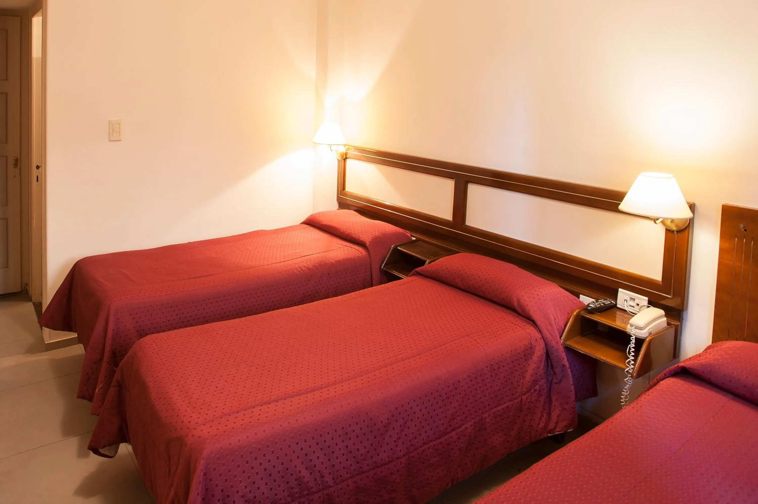 Bed in Hotel Carollo