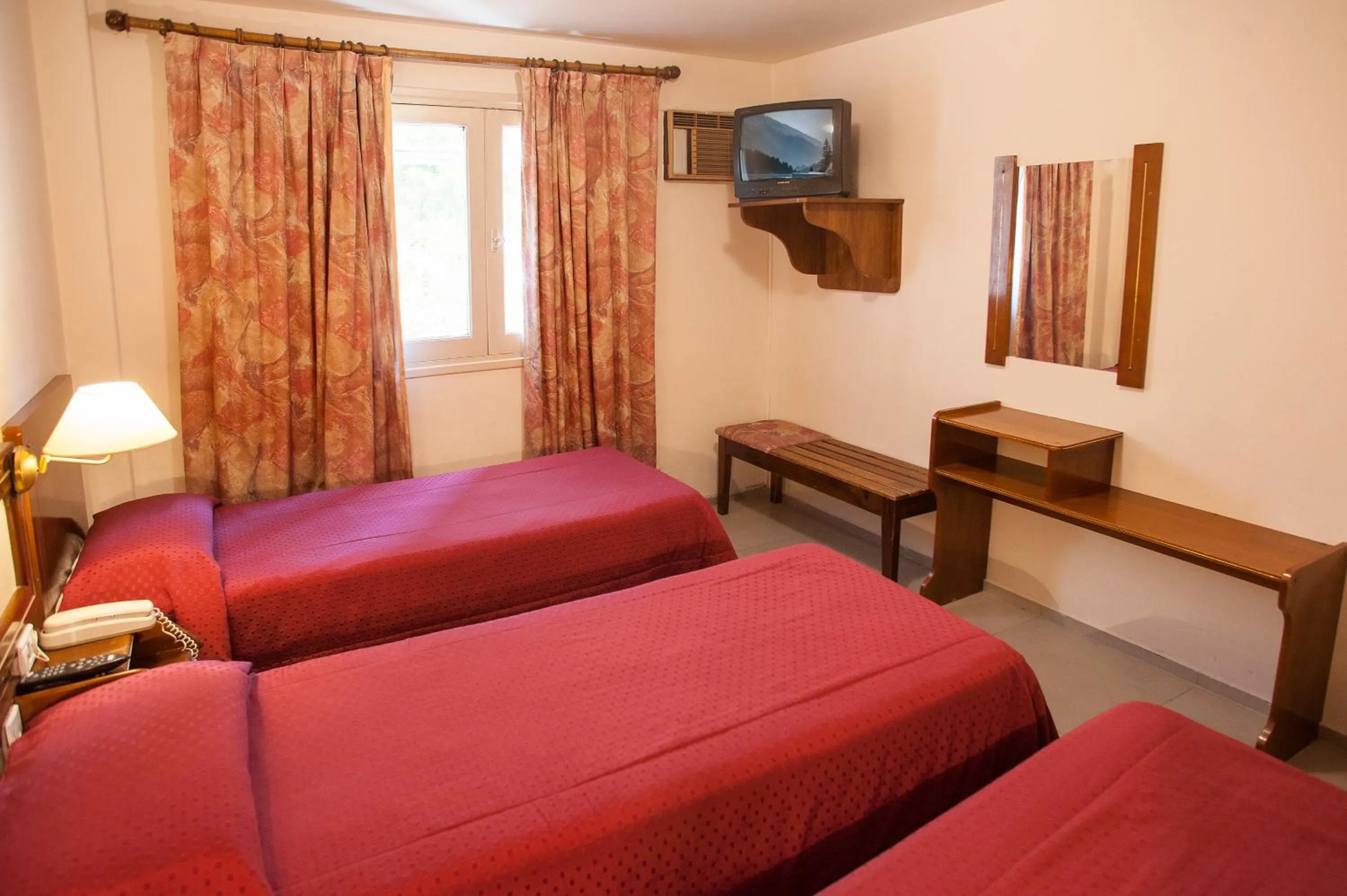 Bed in Hotel Carollo