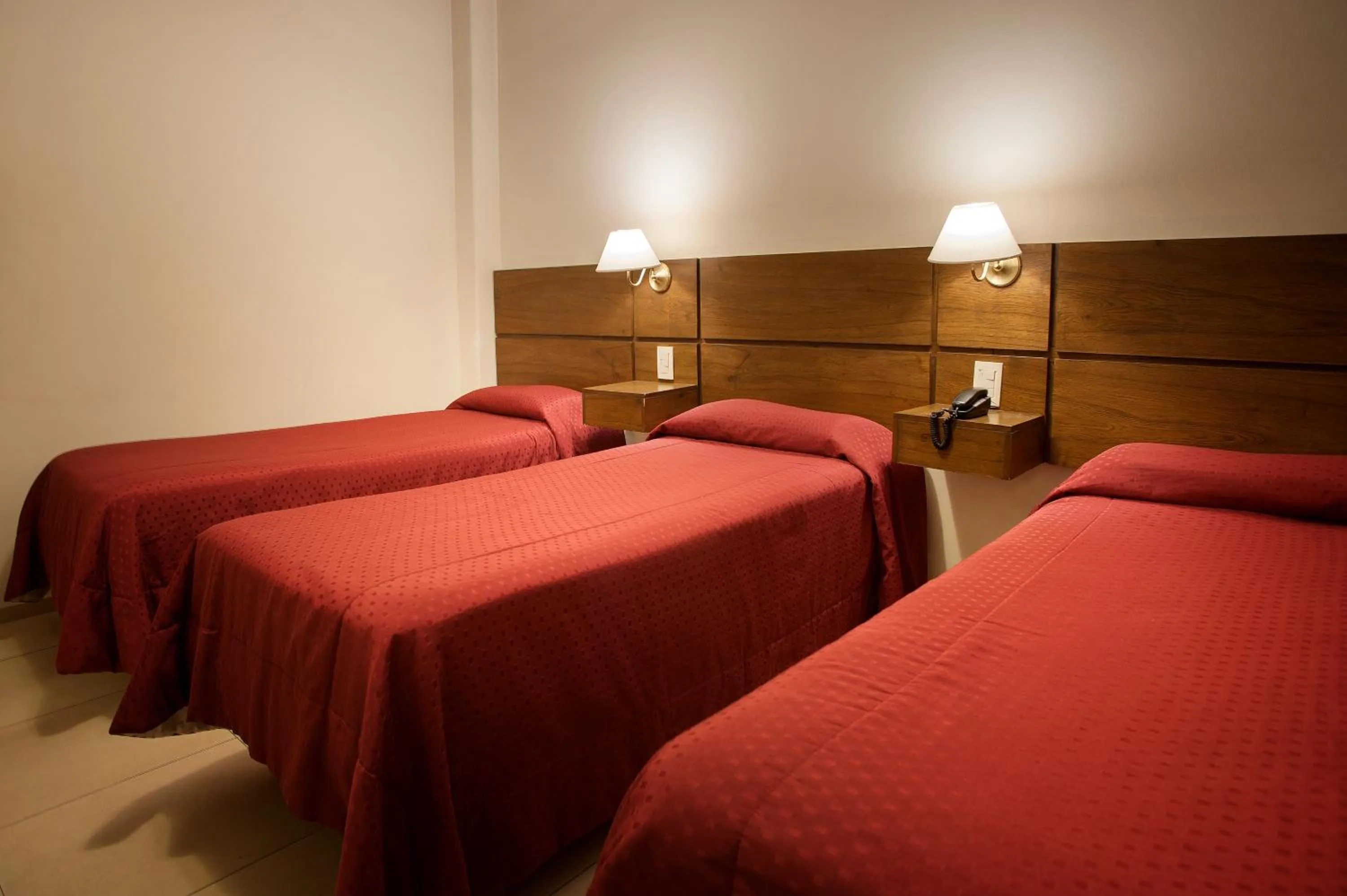 Bed in Hotel Carollo