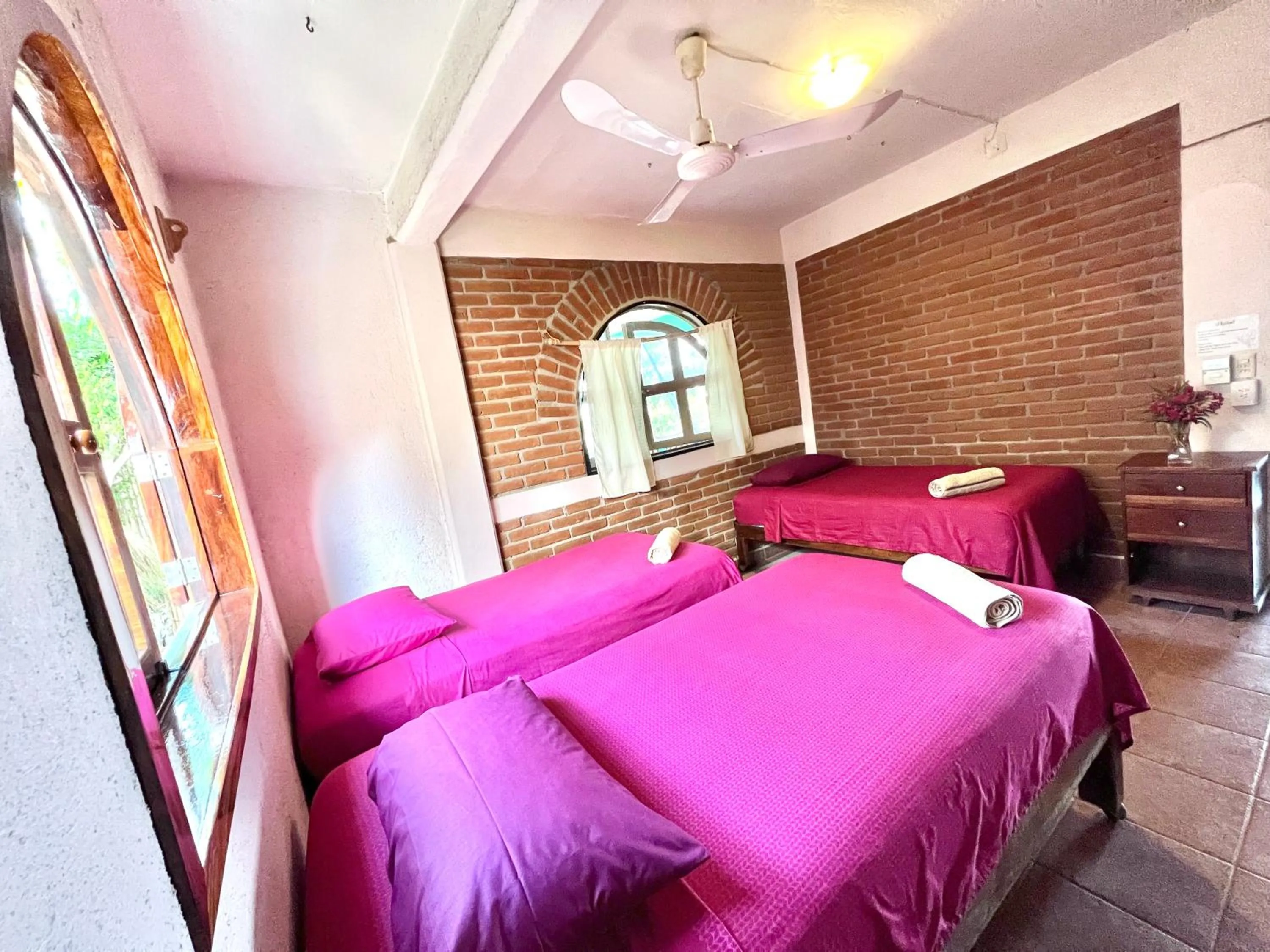 Bed in Ananda Guest House Yoga & Meditación