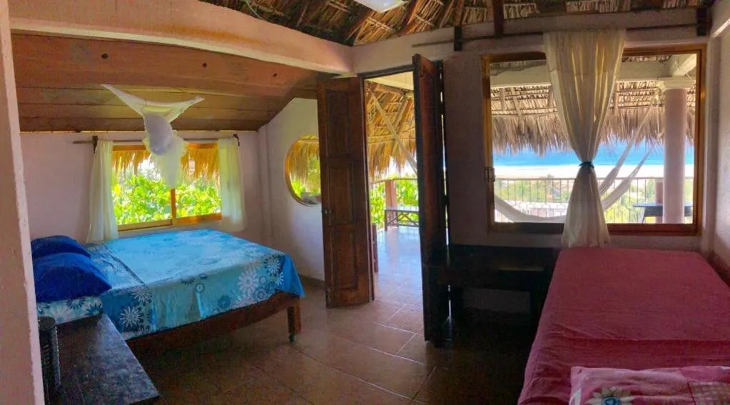 Balcony/Terrace, Bed in Ananda Guest House Yoga & Meditación