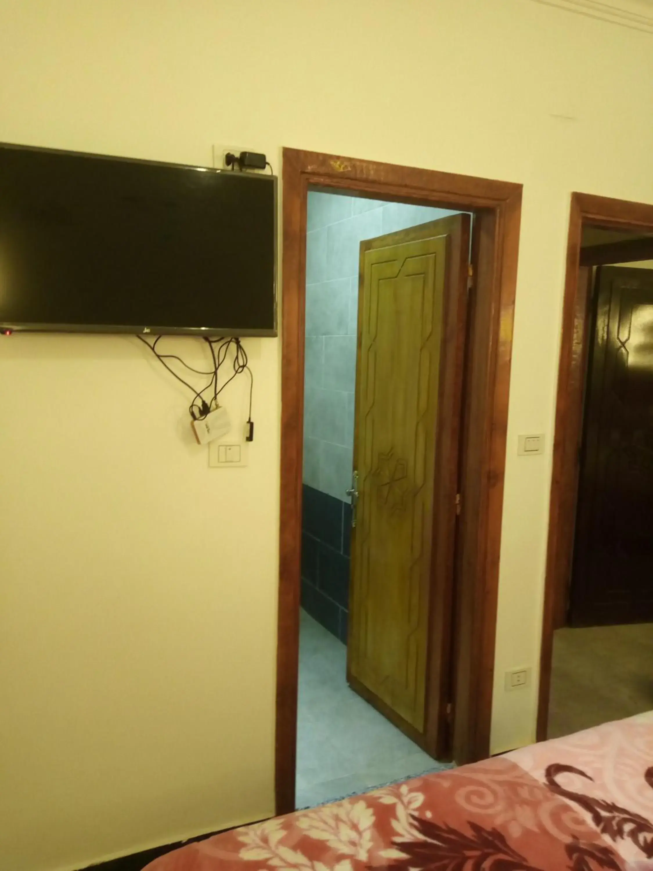 Bathroom, TV/Entertainment Center in Arabian Nights Hostel