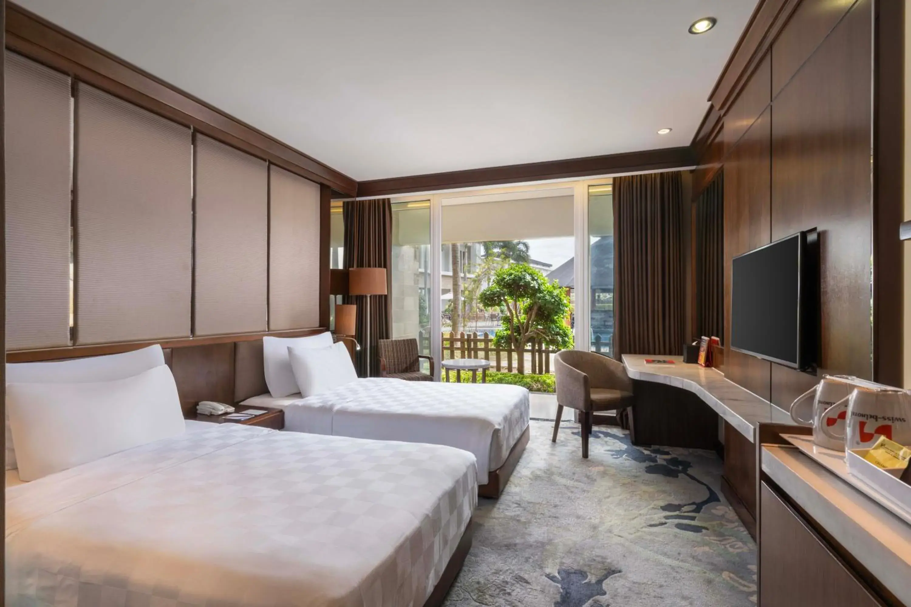 Deluxe Twin Pool Terrace in Swiss-Belhotel Borneo Banjarmasin Deluxe Twin Pool Terrace in Swiss-Belhotel Borneo Banjarmasin