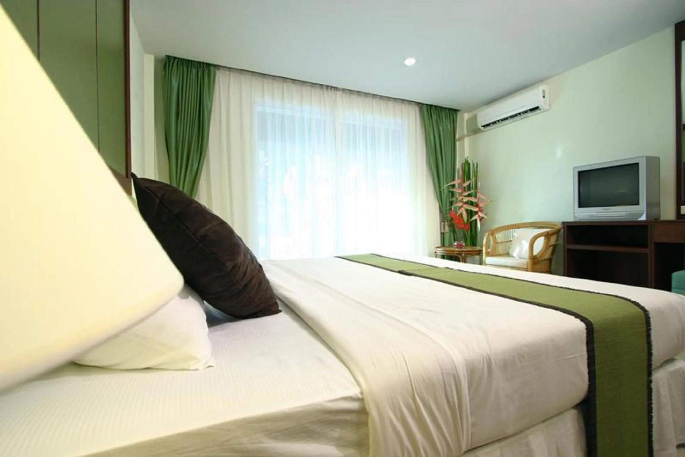 Bedroom, Bed in Windmill Resort Hotel Pattaya