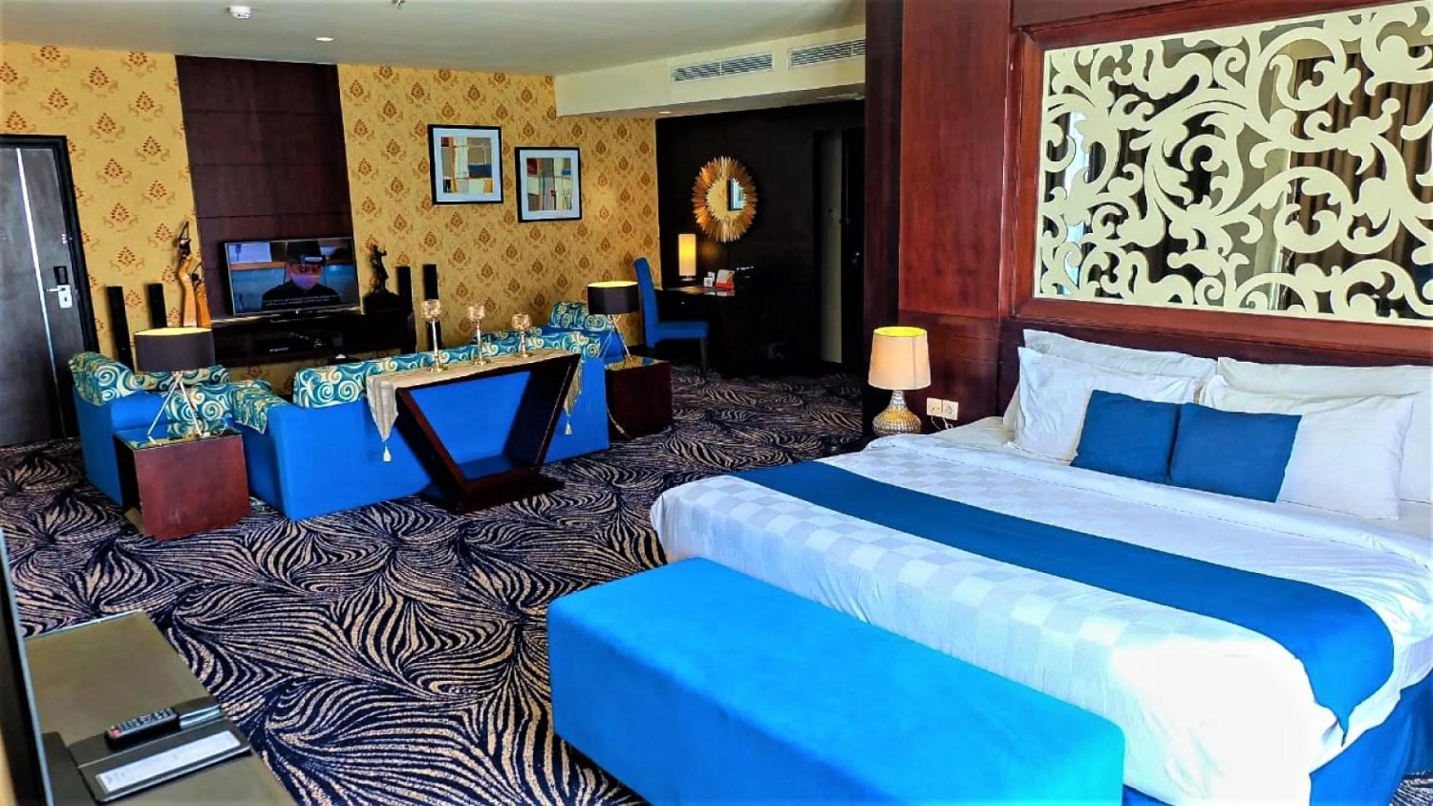 TV and multimedia, Bed in Swiss-Belhotel Silae Palu