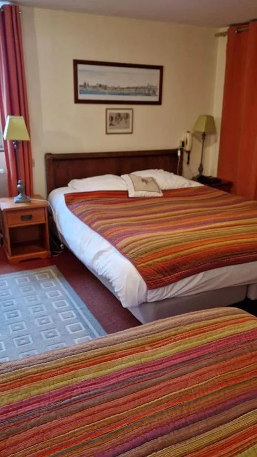 Bed in Logis Cote Loire - Auberge Ligerienne
