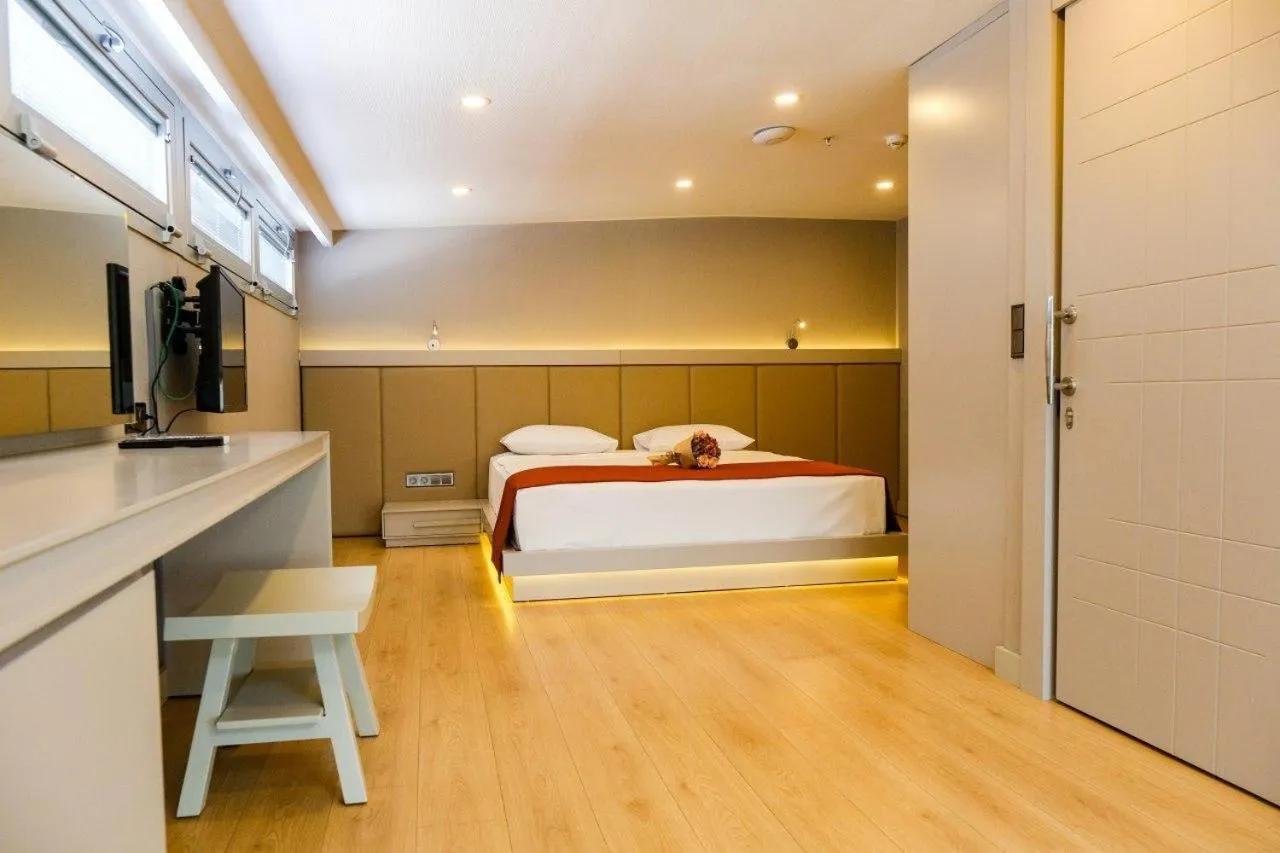 Bedroom in Kaila Beach Hotel - All Inclusive