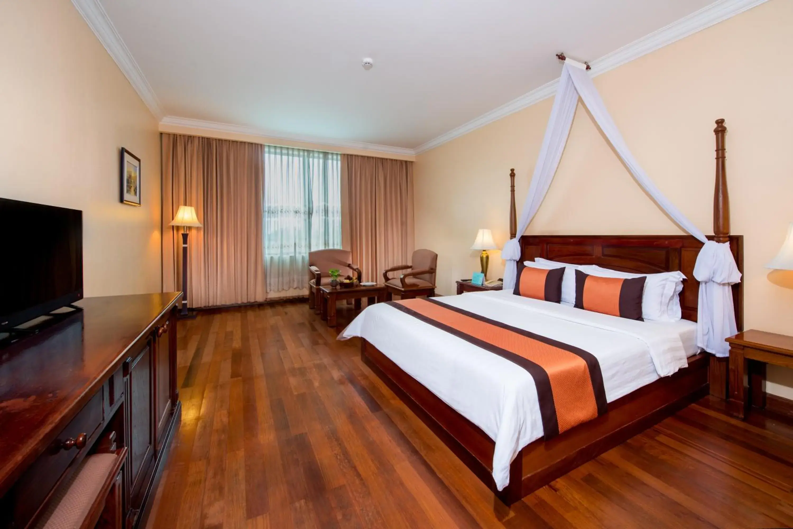 Bed in Pacific Hotel & Spa