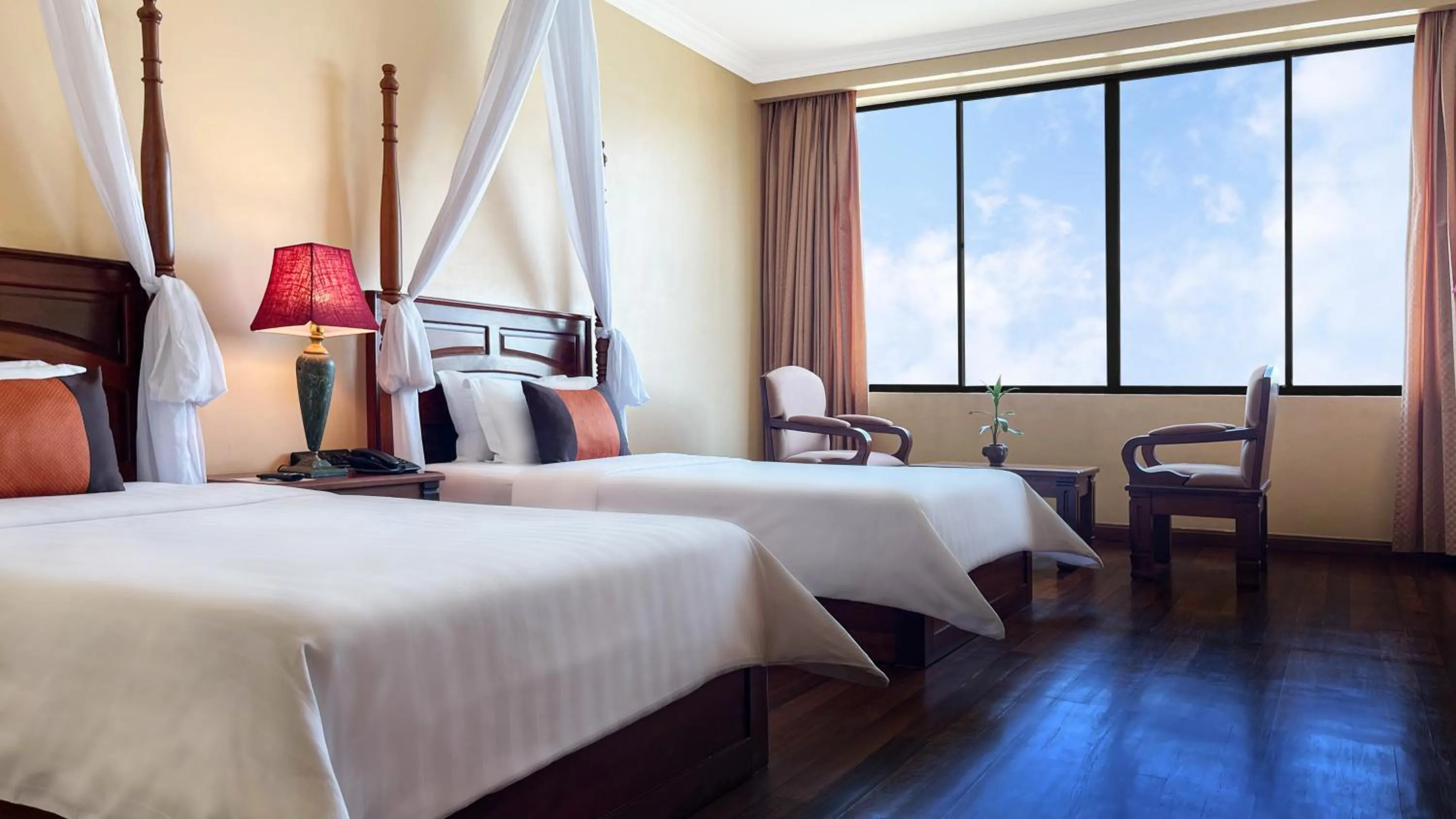 Bed in Pacific Hotel & Spa