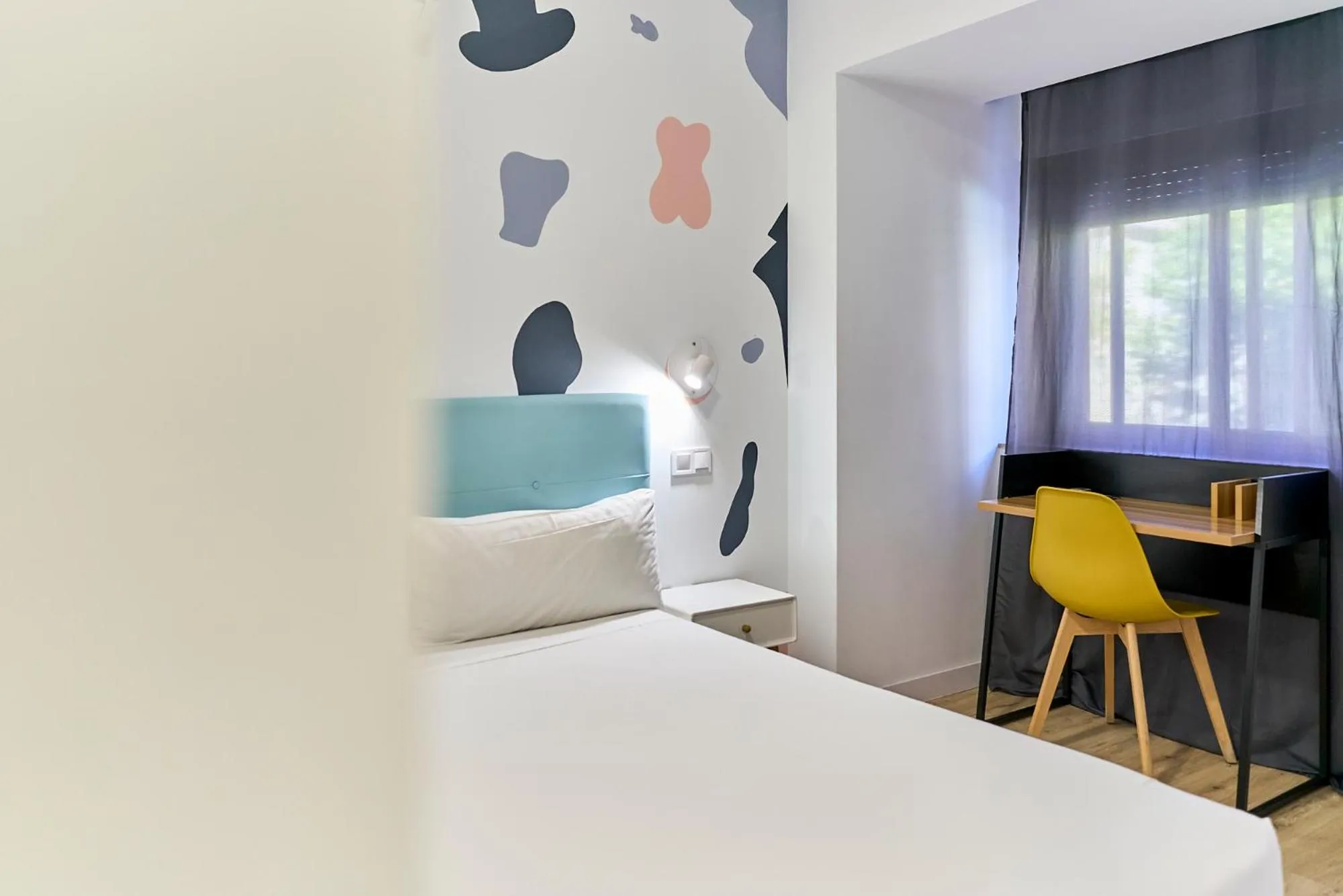 Bed in Hostal Carmen by gaiarooms