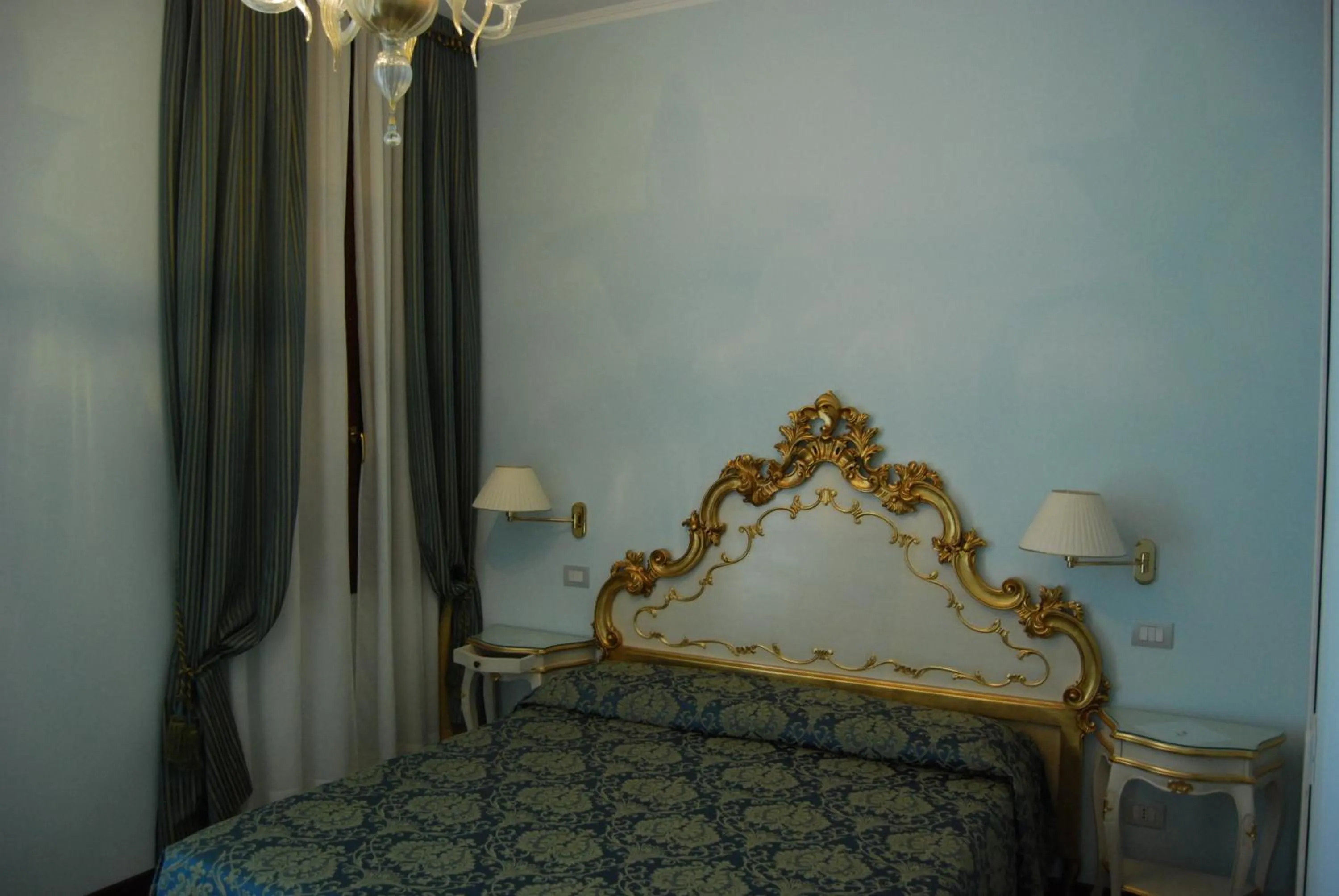 Photo of the whole room, Bed in Alloggi Santa Sofia