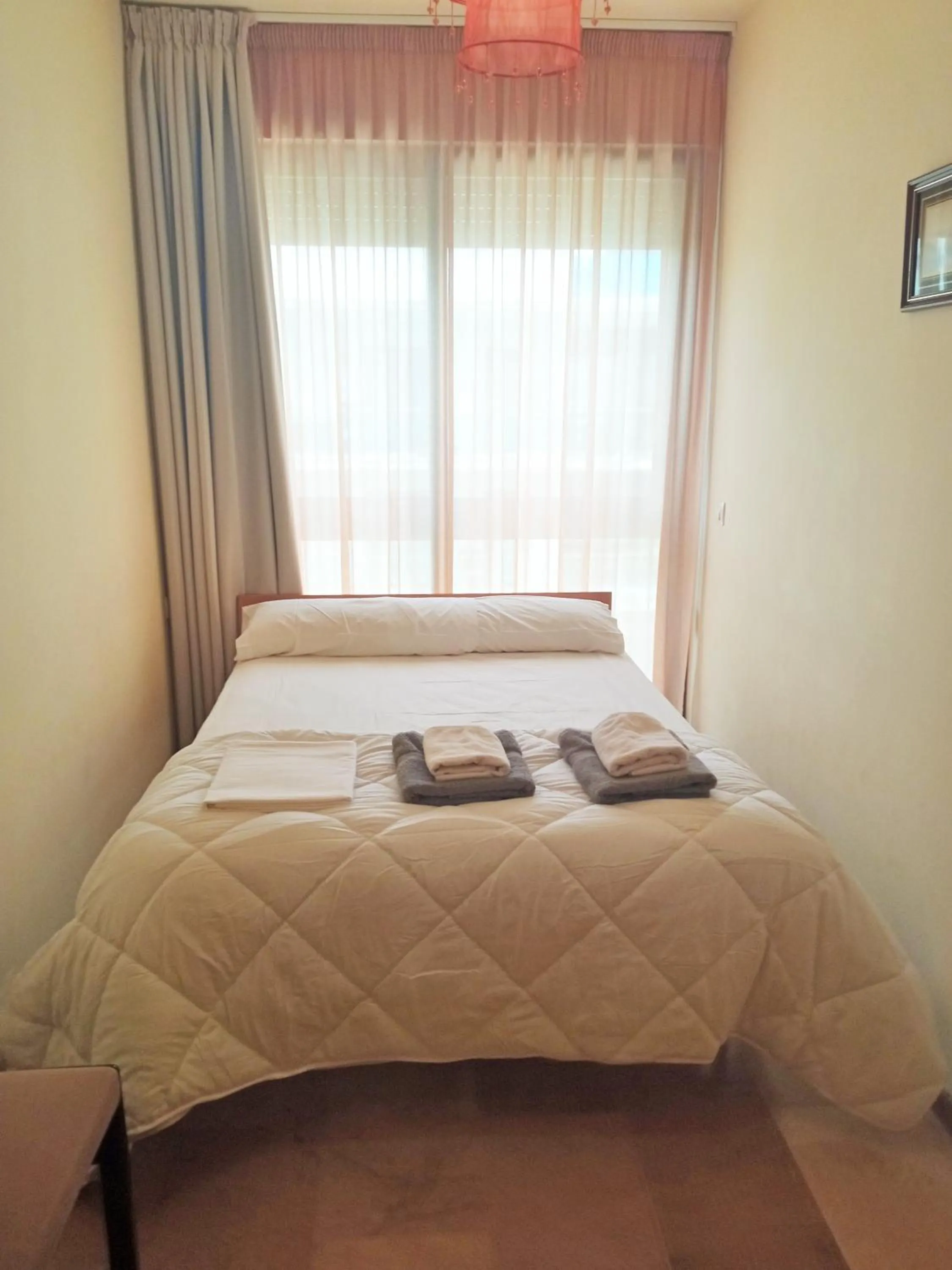 Bedroom, Bed in Apartamento Ainara Garden Family