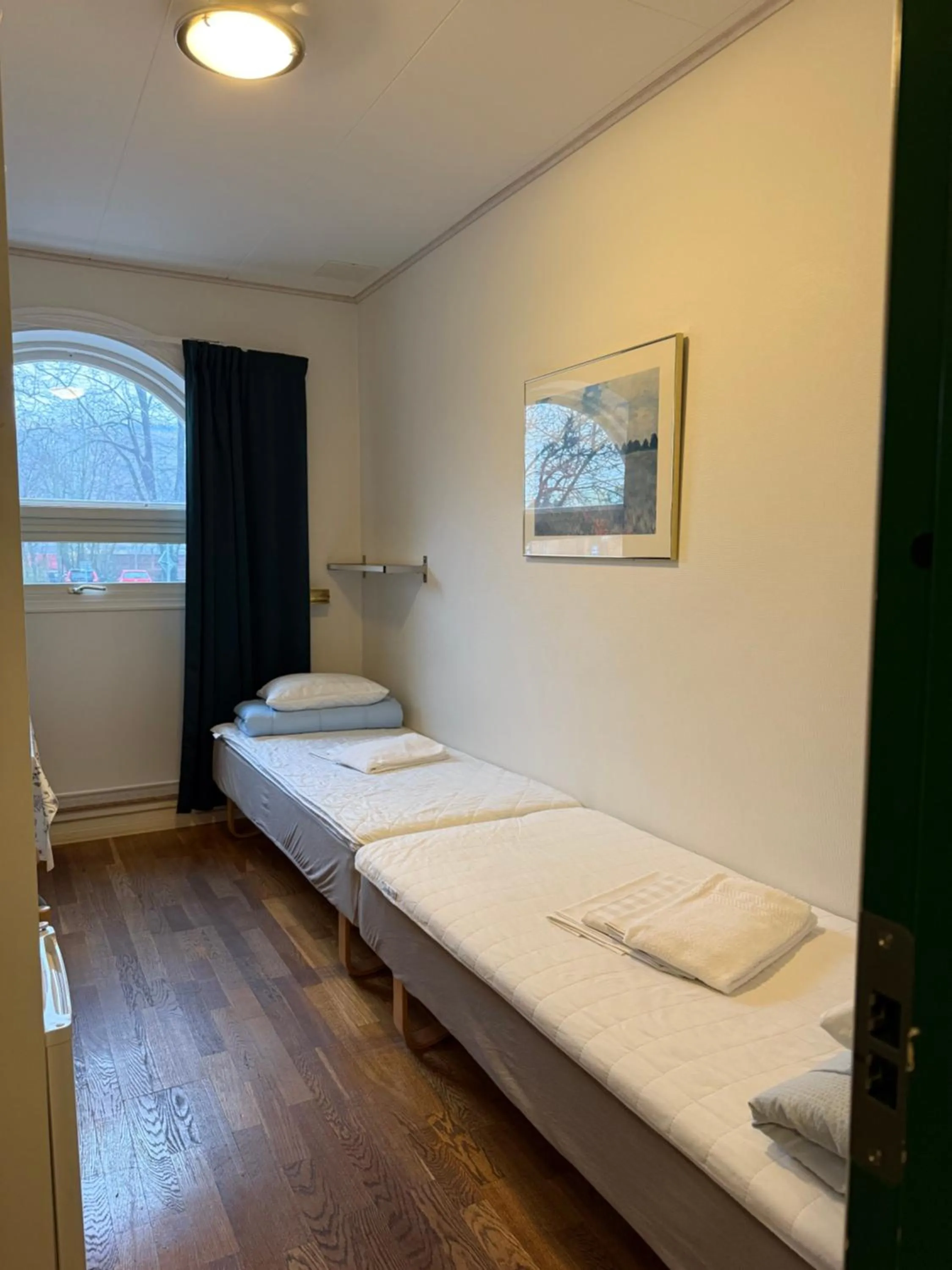 Photo of the whole room, Bed in Torget Vandrarhem