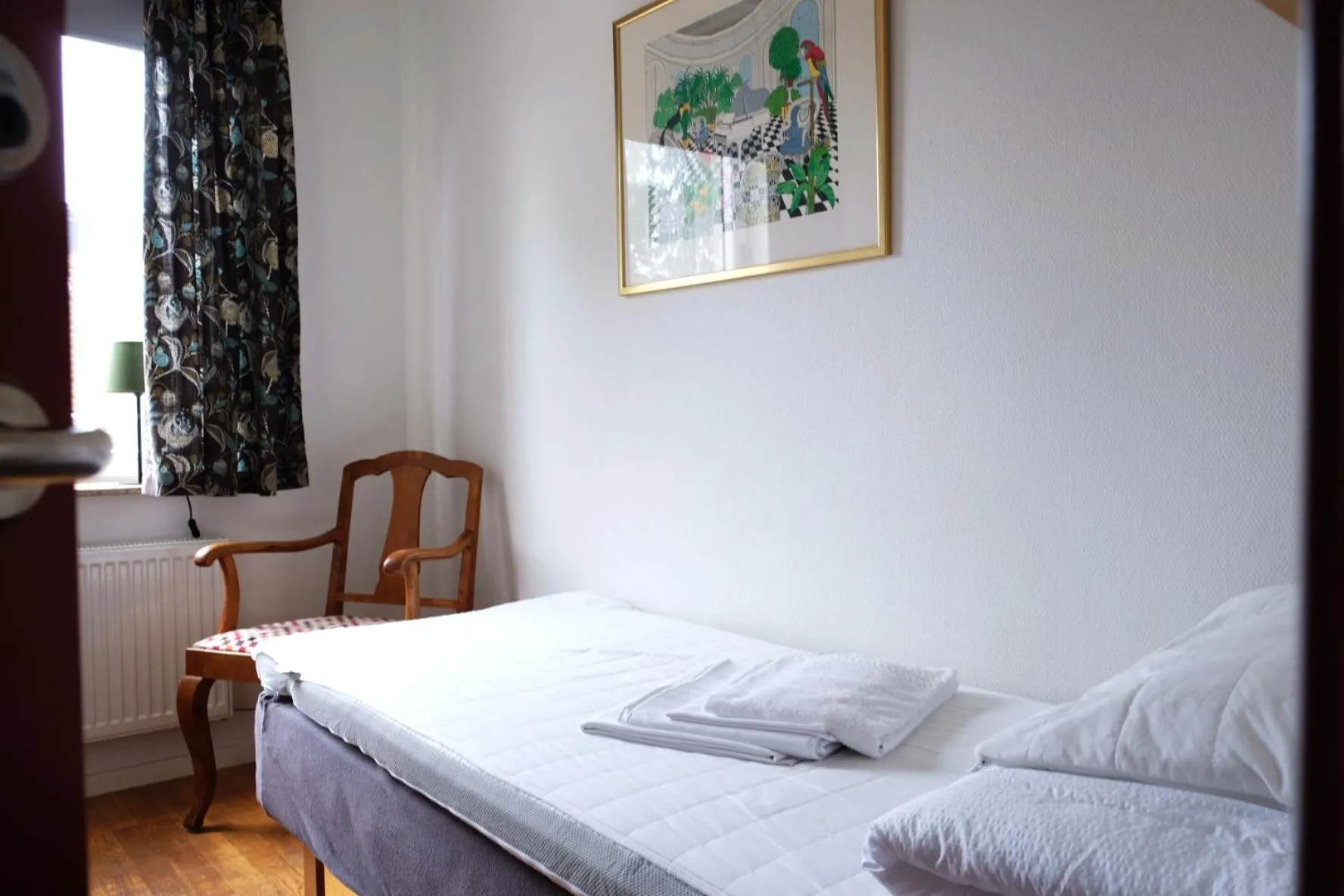 Photo of the whole room, Bed in Torget Vandrarhem