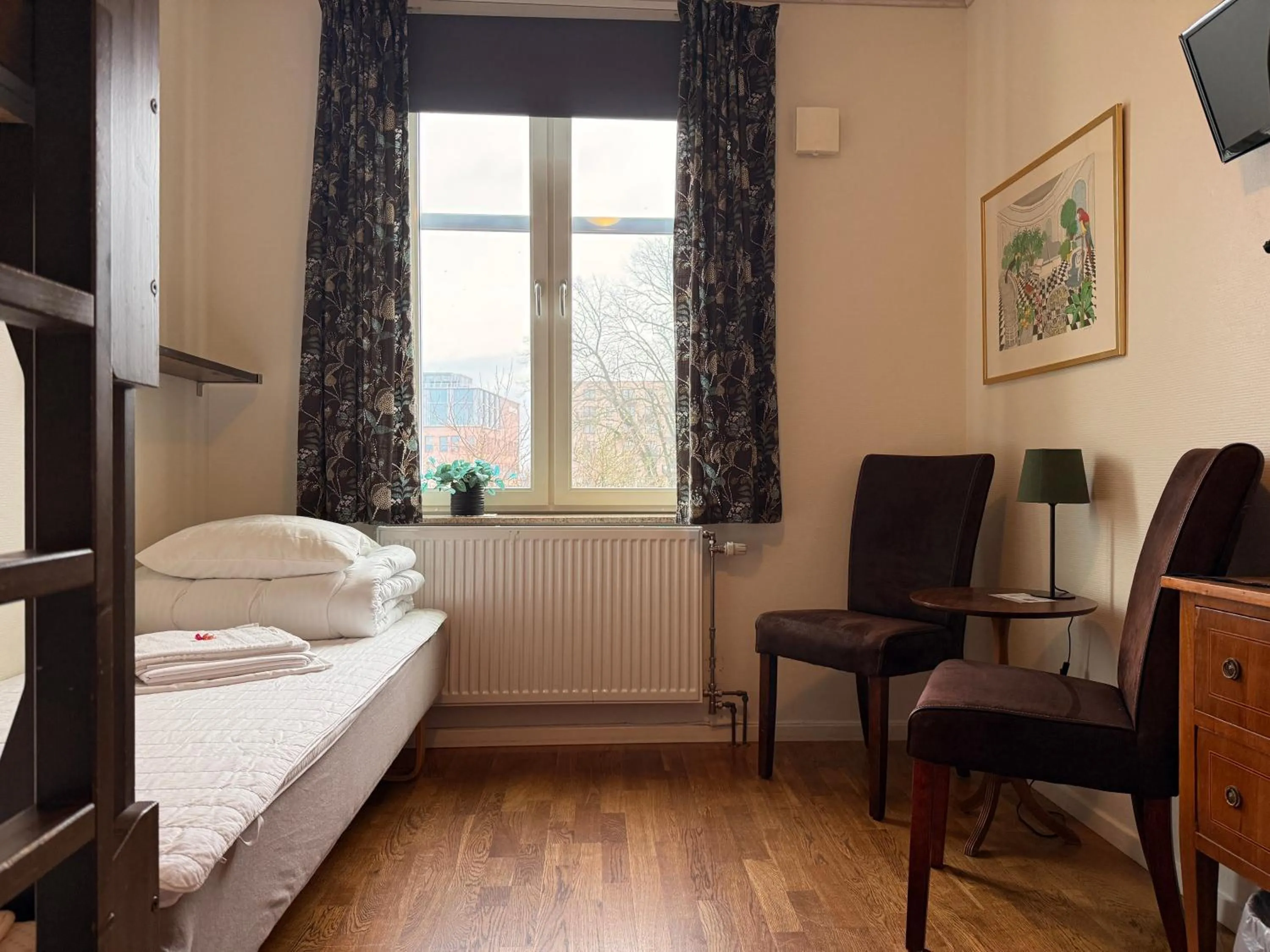 Photo of the whole room, Bed in Torget Vandrarhem