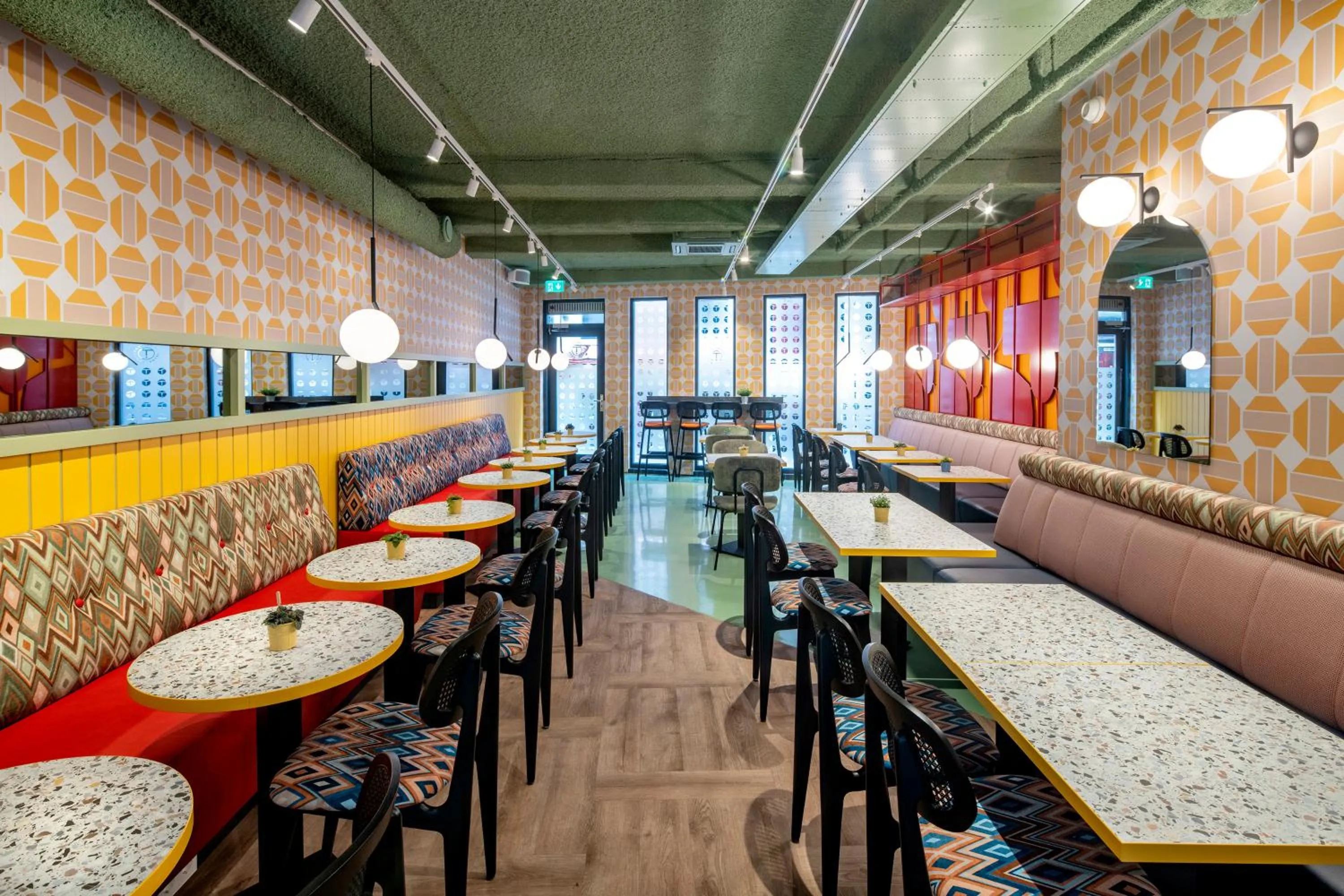 Communal lounge/ TV room in Tourist Inn One Amsterdam