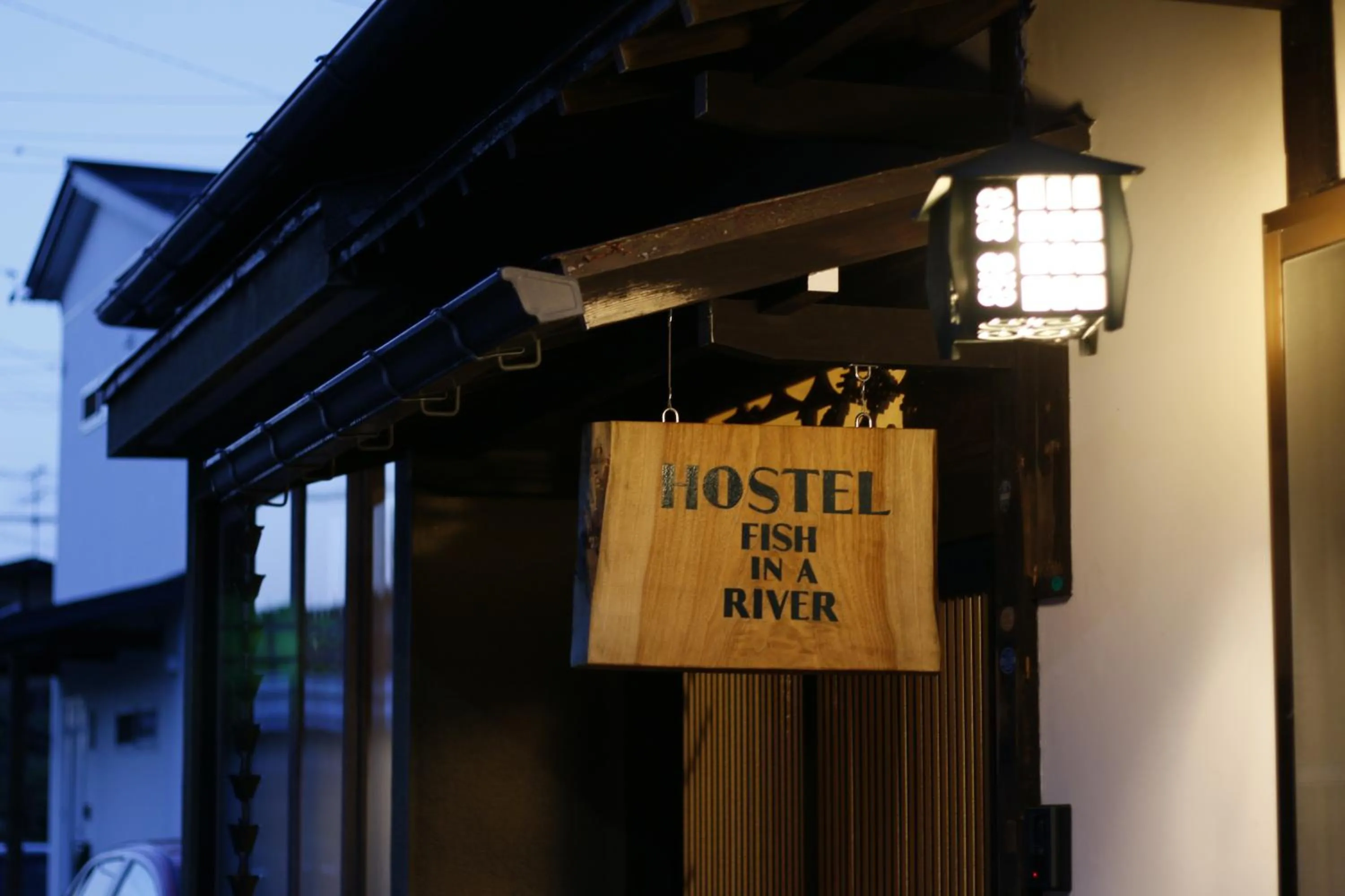 Property logo or sign in Hostel Fish in a River