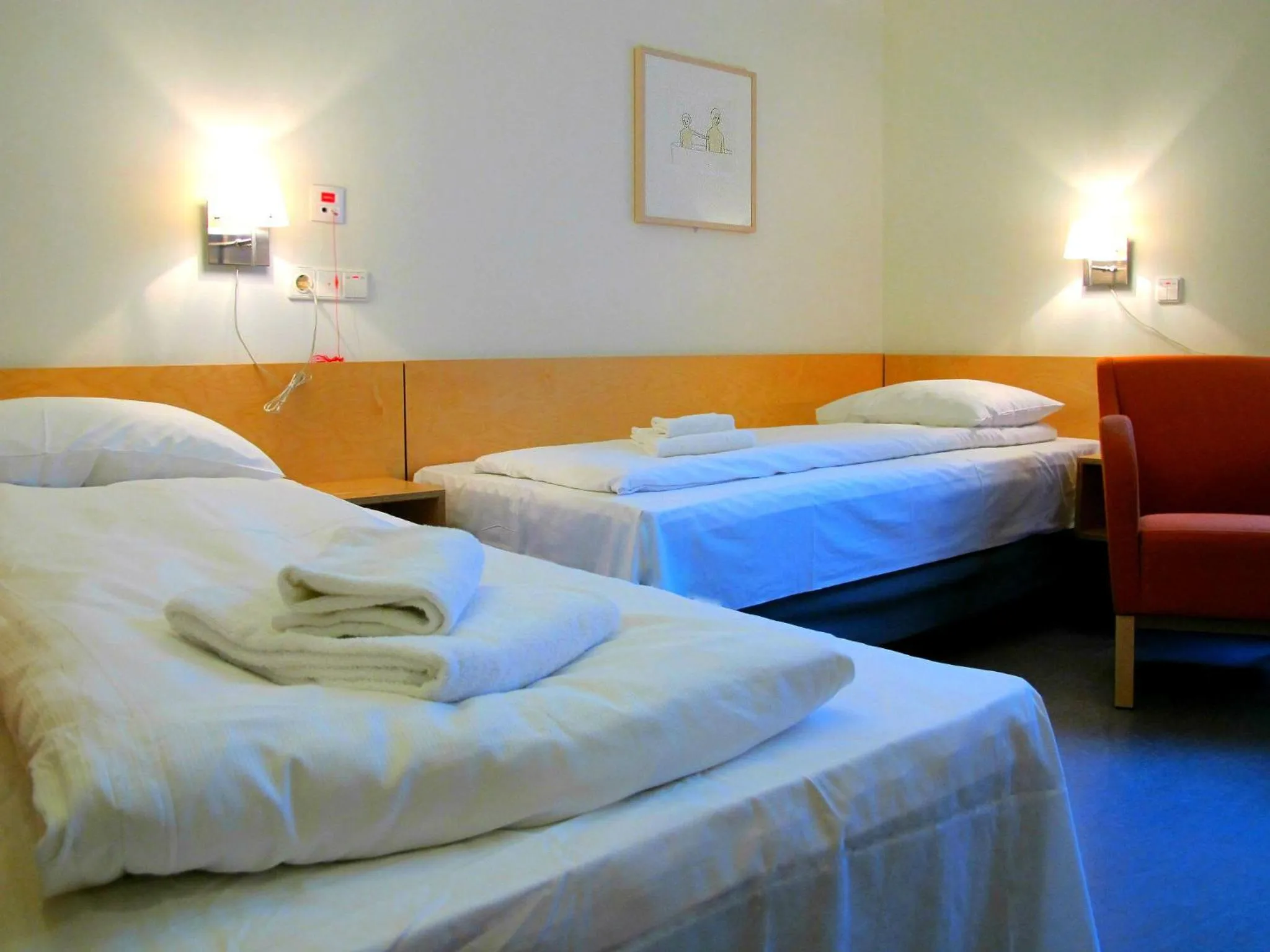 Bed in Hotel St. Olav