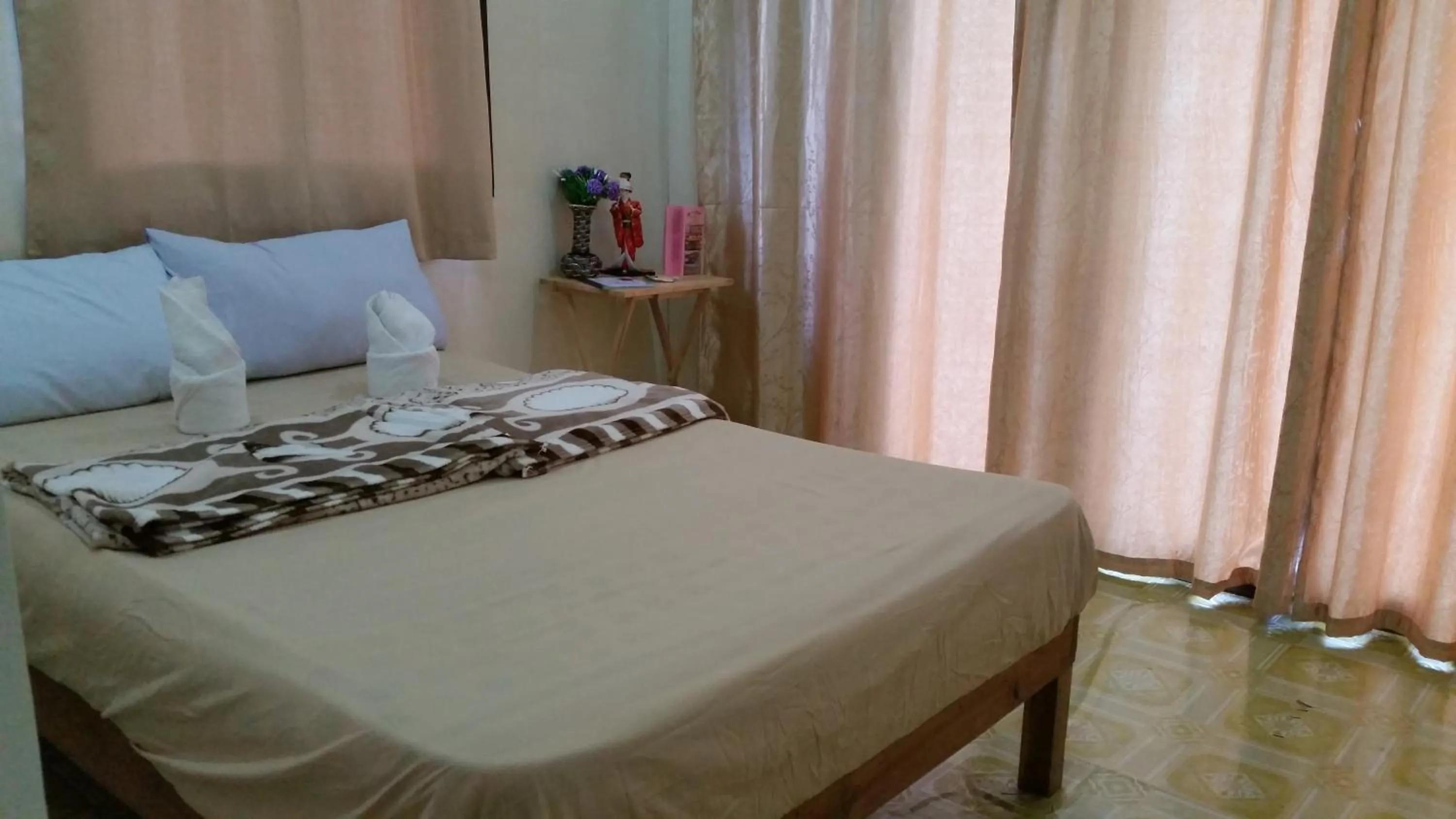 Bed in Villa Encantador Resort